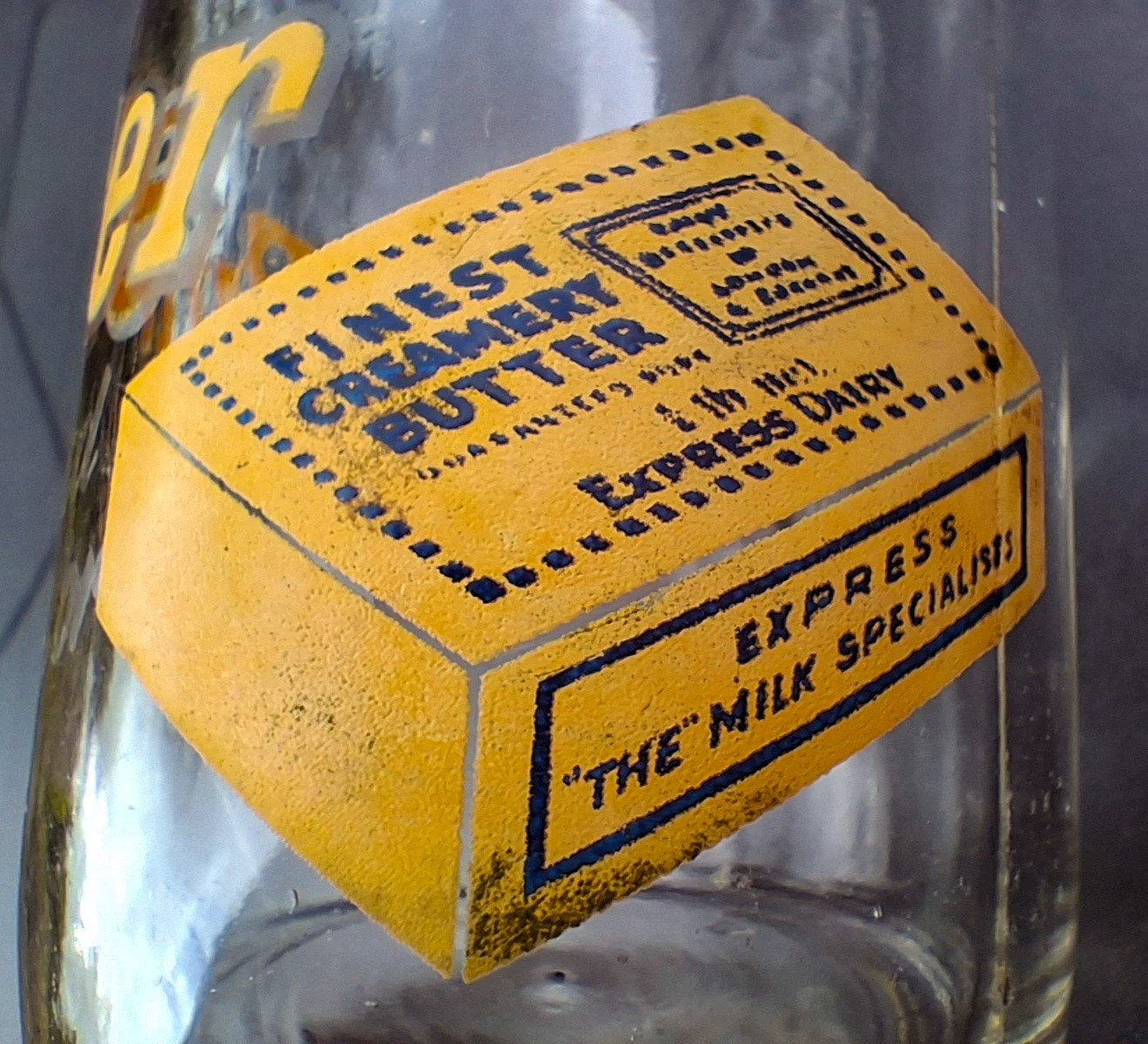 1950s? Interesting Express pint bottle with enamelled butter advertisement. (Courtesy eBay apbr20)