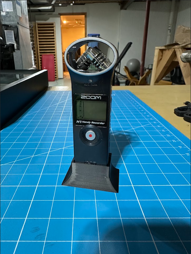 Photo of digital recorder standing in 3D printed stand