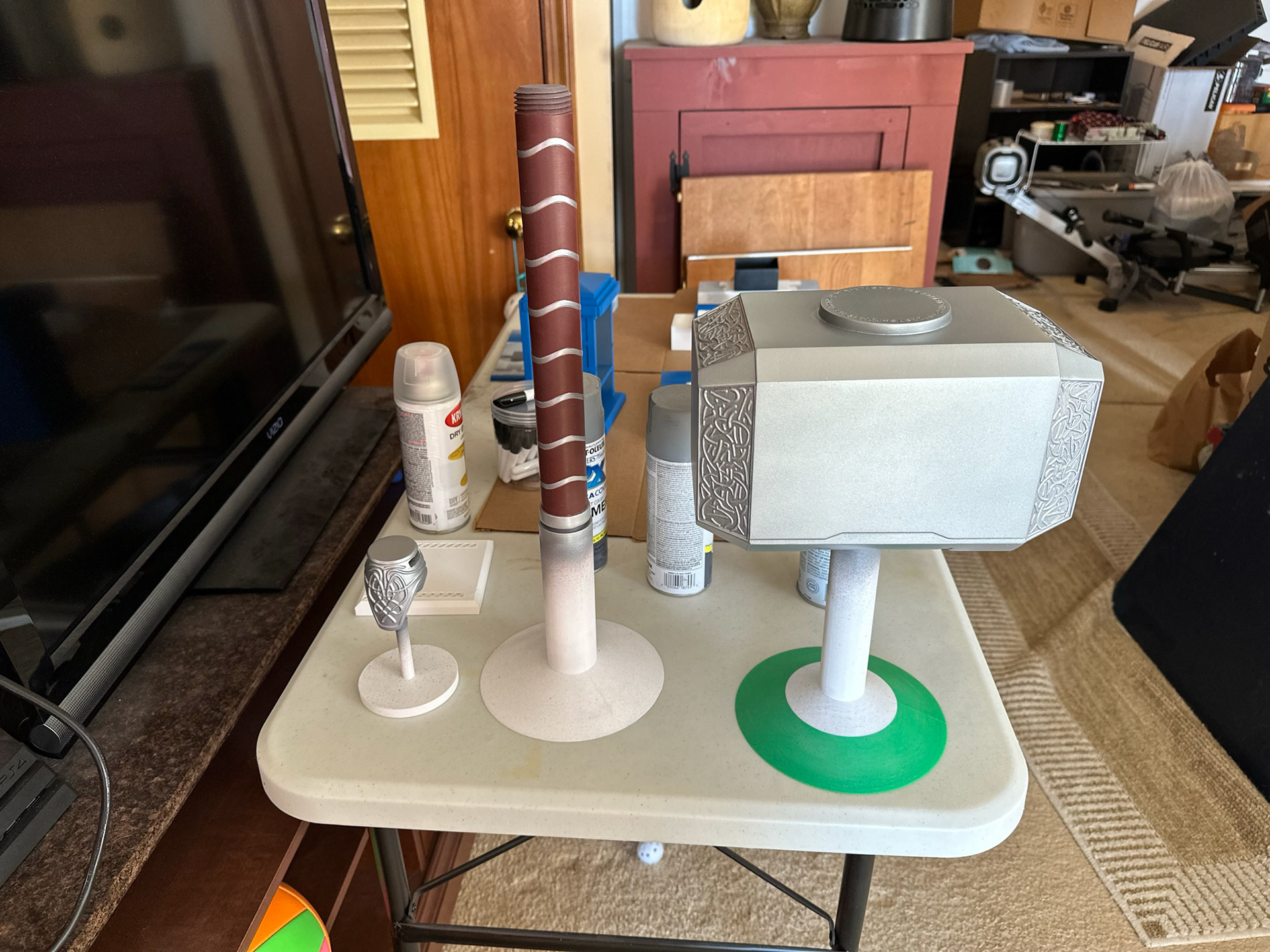 Mjolnir parts on painting stands with near final paint