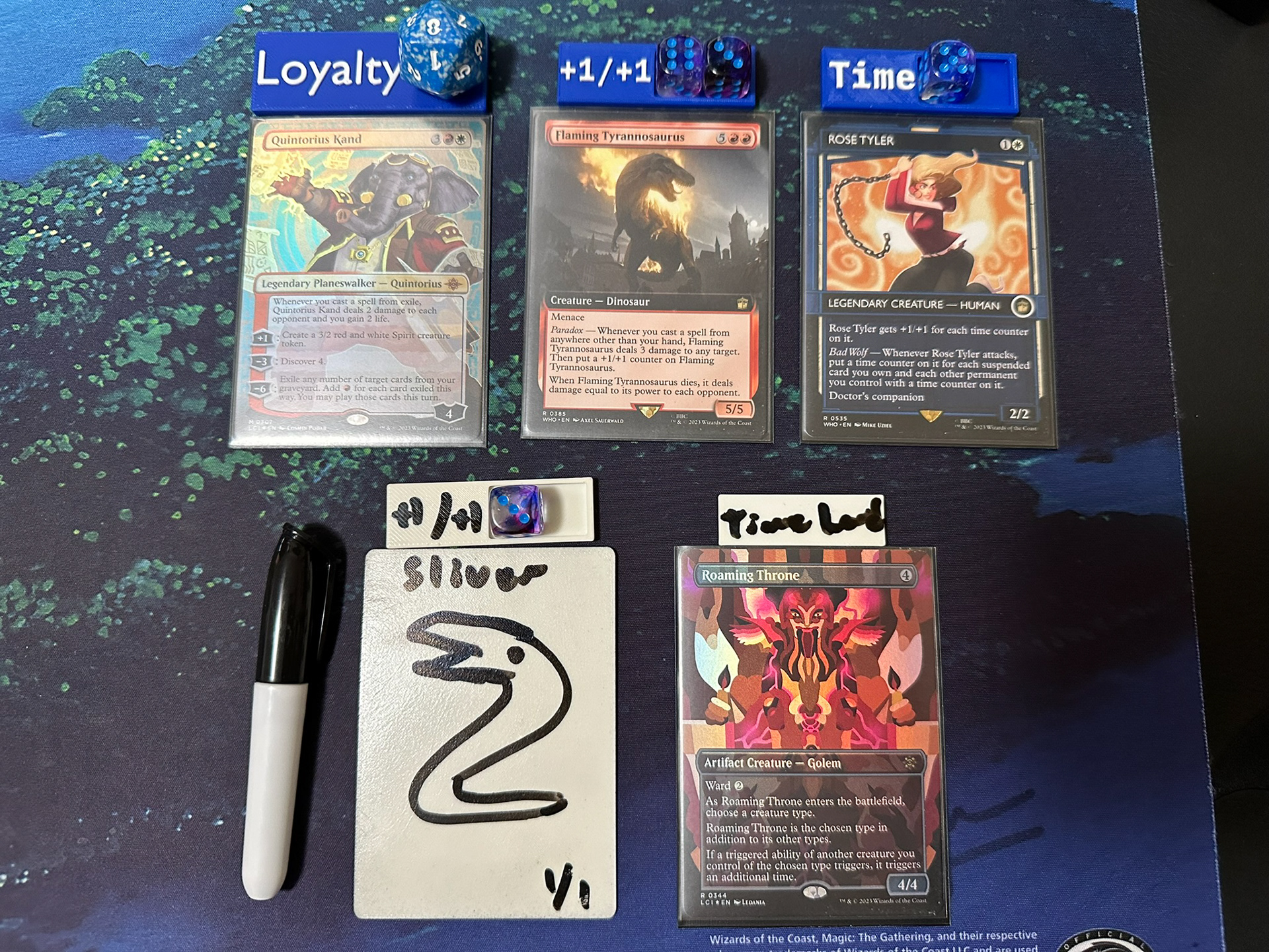 MTG counter trays holding dice near appropriate cards with hand drawn dry erase token