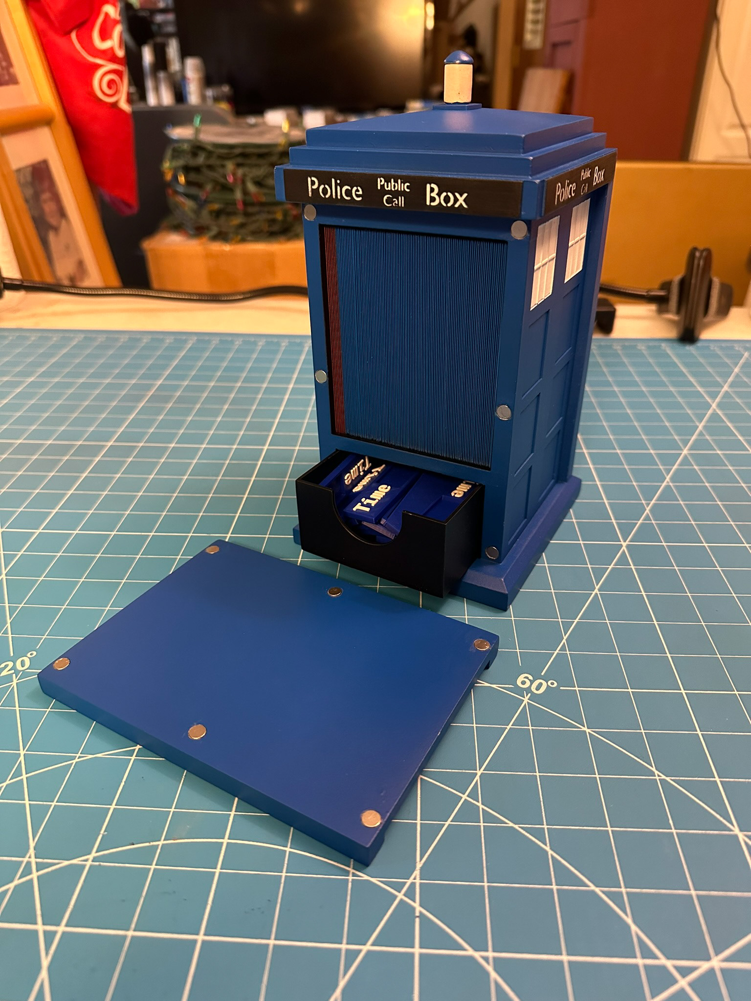 Finished TARDIS deck box opened with deck inside and dice tray half out filled with counters