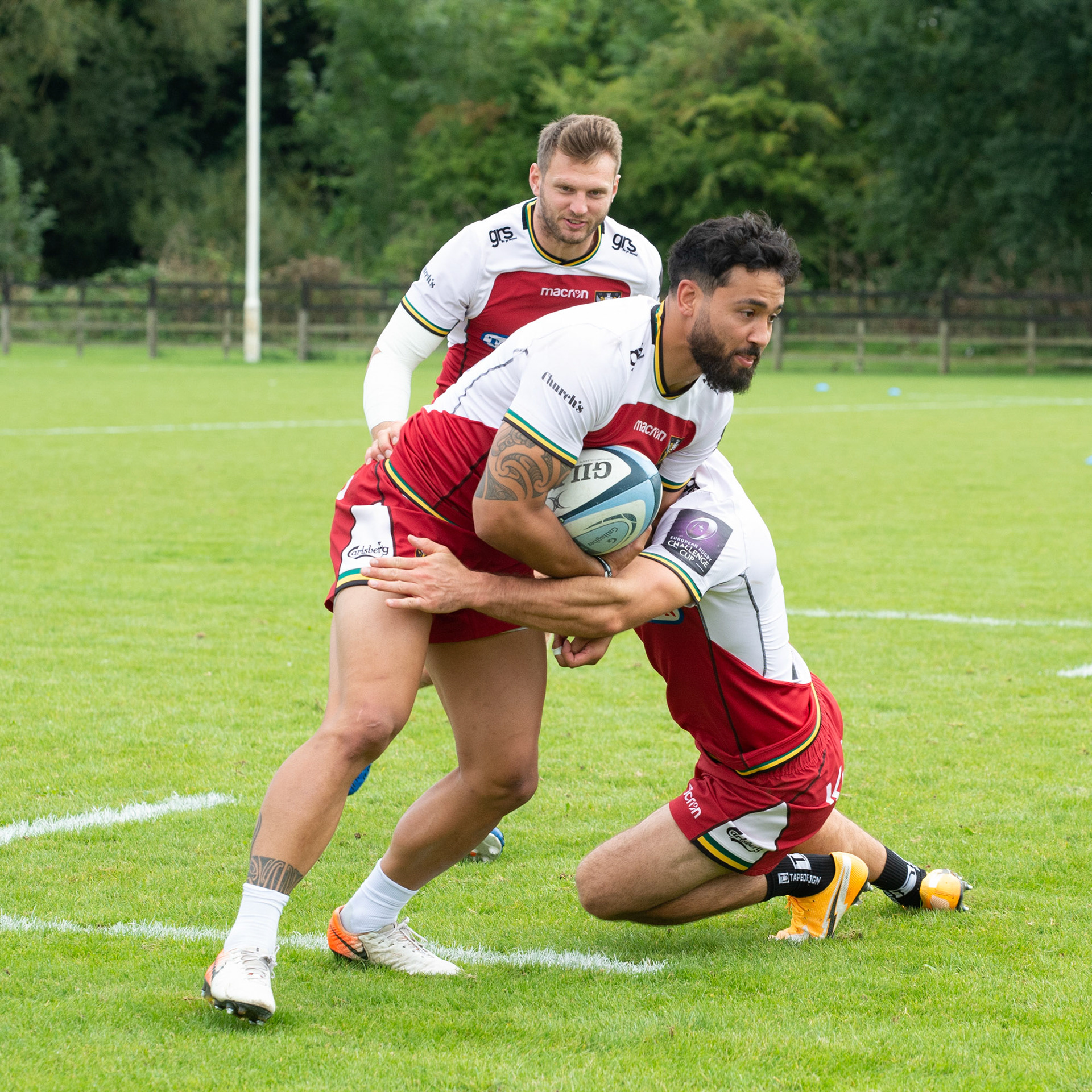 Matt Proctor  with the ball  in training at the Northampton Saints training session at Franklin's Gardens