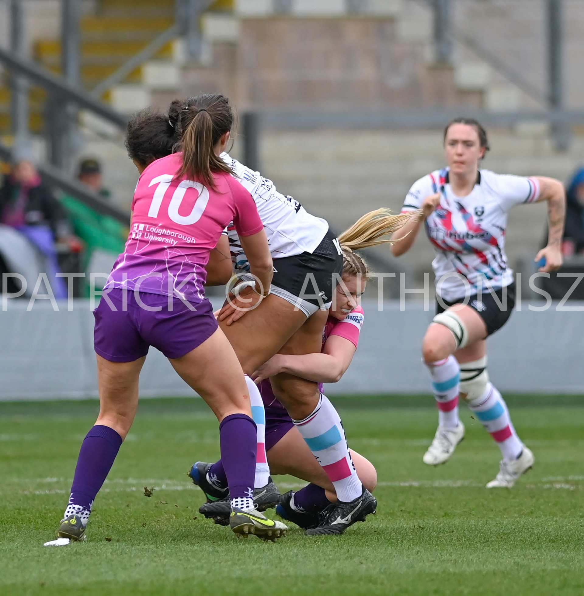 NORTHAMPTON, ENGLAND- Sat-4-2023: Rownita Marston of Bristol Bears is stop by no 10 Helen Nelson of LOUGHBOROUGH and no 15 Chloe Rollie   during the match between  Loughborough Lightning and Bristol Bears at Franklin's Gardens on Sat-4-2023 in Northampton, England