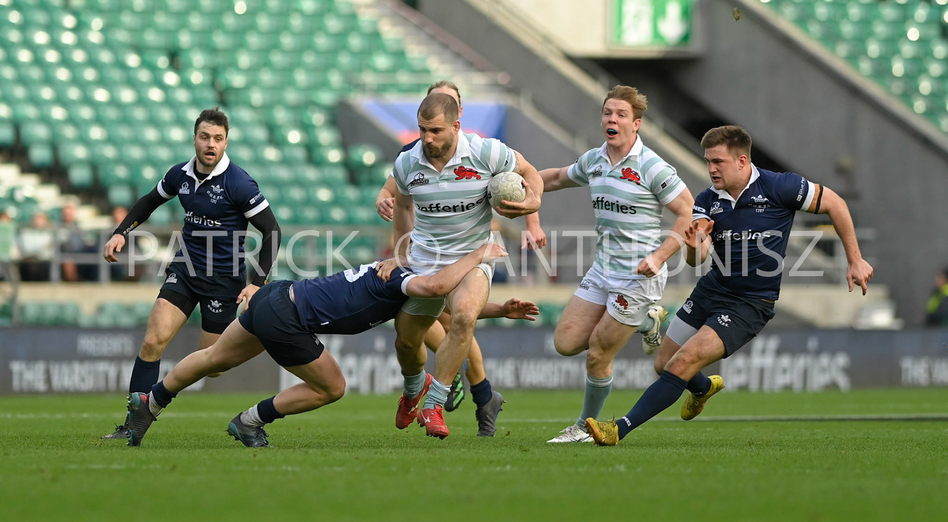 LONDON, ENGLAND March 25: Tommaso Castello (Hughes Hall) Cambridge  tries  break away from the Cambridge defenders during the  Oxford University vs Cambridge University Men's Varsity match at Twickenham Stadium on Saturday March 25-2023 in London, England.