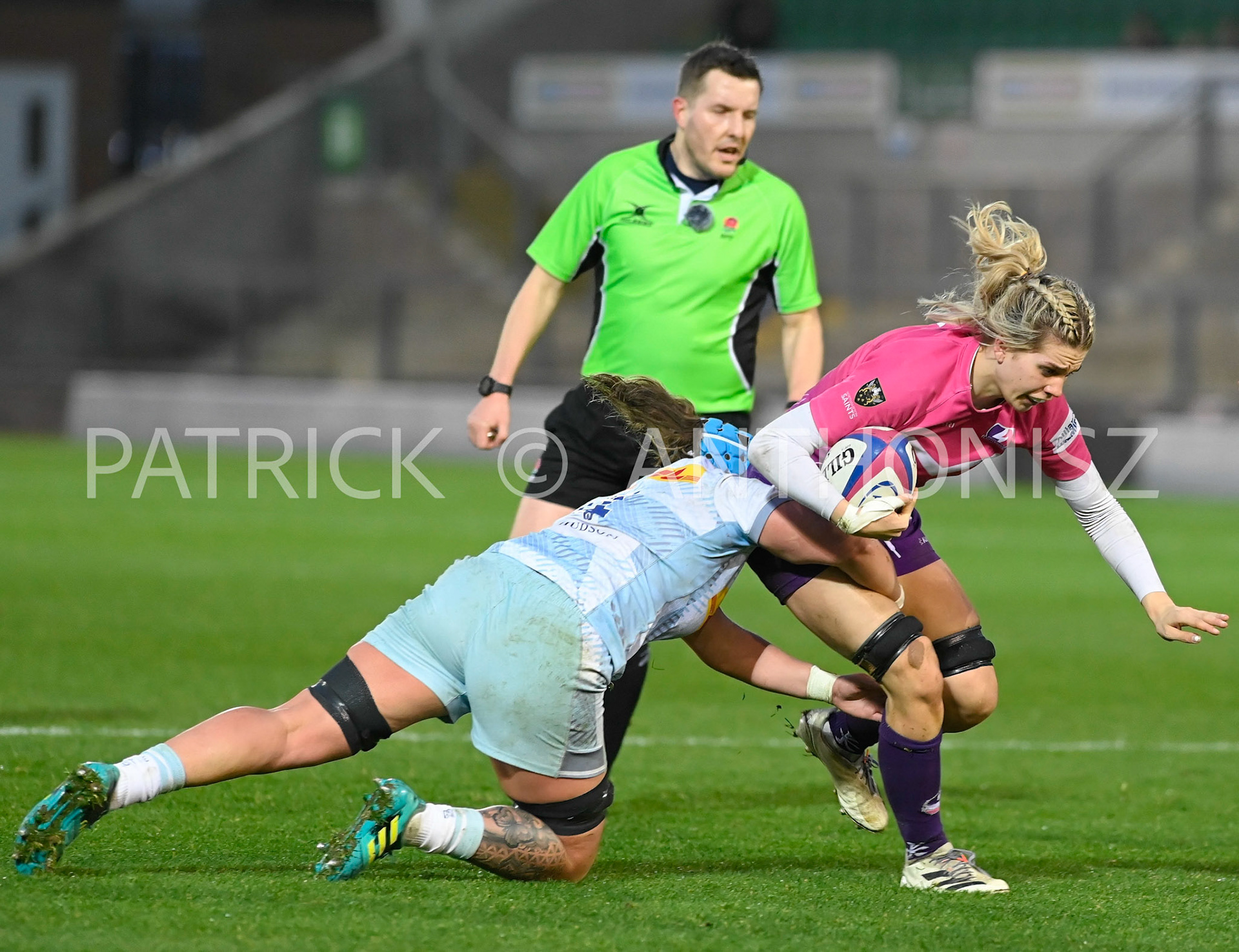 NORTHAMPTON, ENGLAND- Nov -27 - 2022 :  Katy Mew of Harlequins  takes down Lilli Ives Campion of Loughborough Lightning  during the match between Loughborough Lightning Vs Harlequins at Franklin's Gardens on November 27, 2022 in Northampton, England