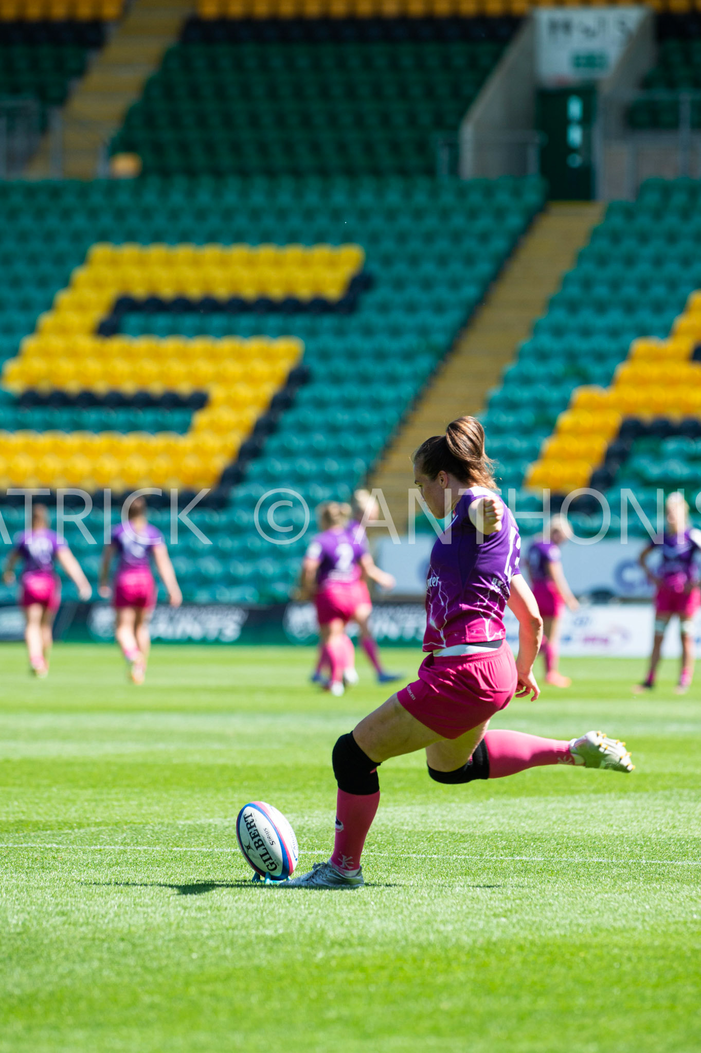 Northampton -14–May-2022.EMILY SCARRATT (CAPTAIN) of Loughborough goes for a kick during the   Loughborough Lightning Vs Harlequins Womens match at cinch Stadium Franklin's Gardens Northampton  .