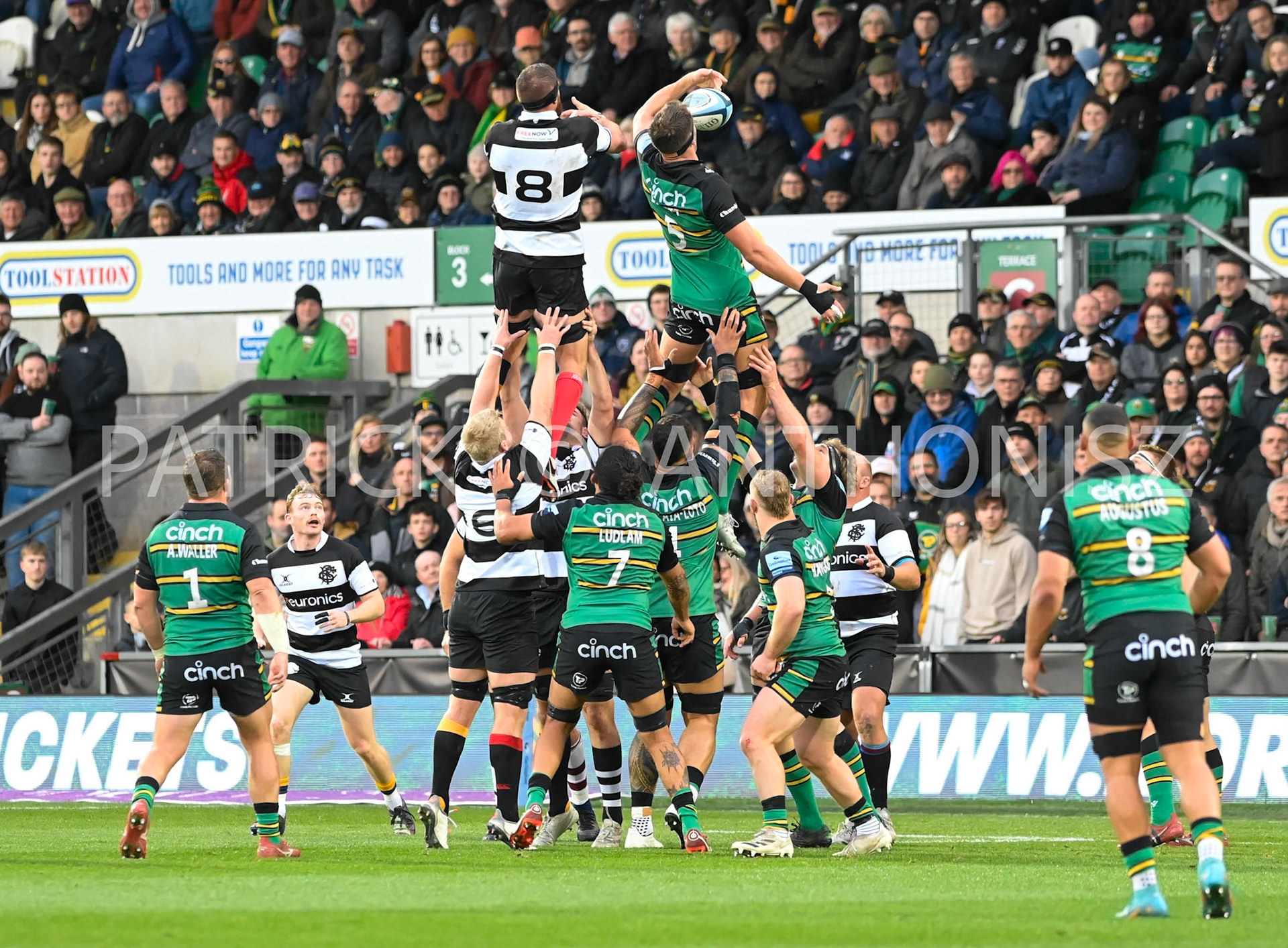 NORTHAMPTON, ENGLAND- Nov -26 - 2022 : Tom Lockett  of Northampton Saints wins the ball  during the match between Northampton Saints and The Barbarians F C at Franklin's Gardens on November 26, 2022 in Northampton, England