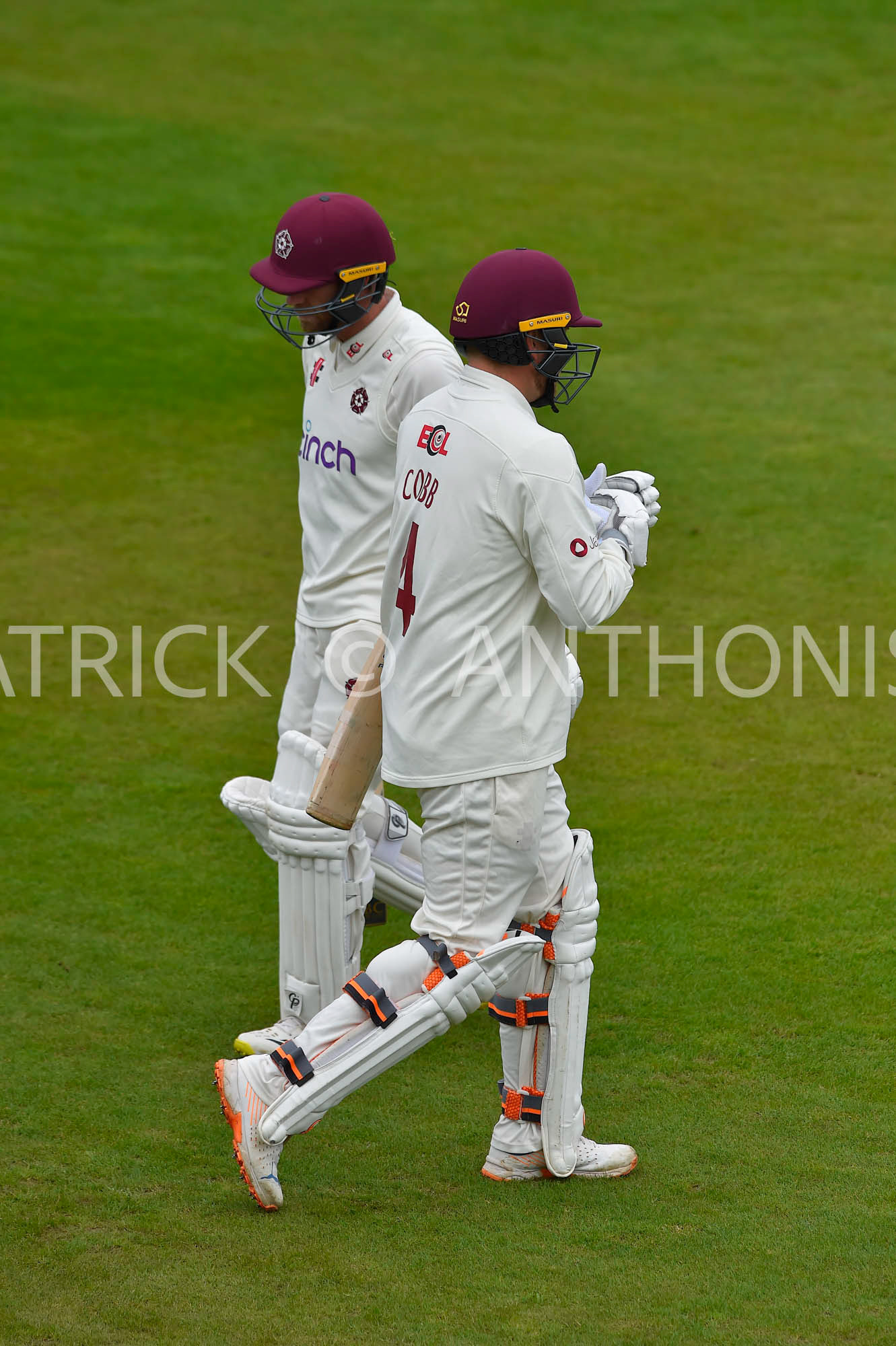 NORTHAMPTON, ENGLAND - April 15 2023 : Josh Cobb enters the field for Northampton while Luke Procter leaves the field during Day 3 of the LV= Insurance County Championship match between Northamptonshire and   Sat  April  15 at The County Ground  in Northampton, England.