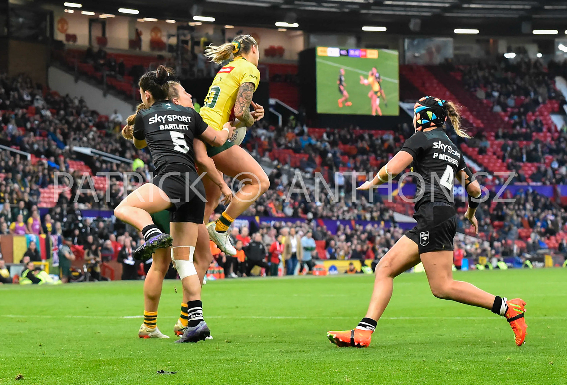 Manchester   ENGLAND - NOVEMBER 19.Julia Robinson of Australia  goes for a high ball during  the Rugby league World Cup Womens Final  between Australia and New Zealand  at the Old Trafford   on November 19 - 2022 in Manchester England.