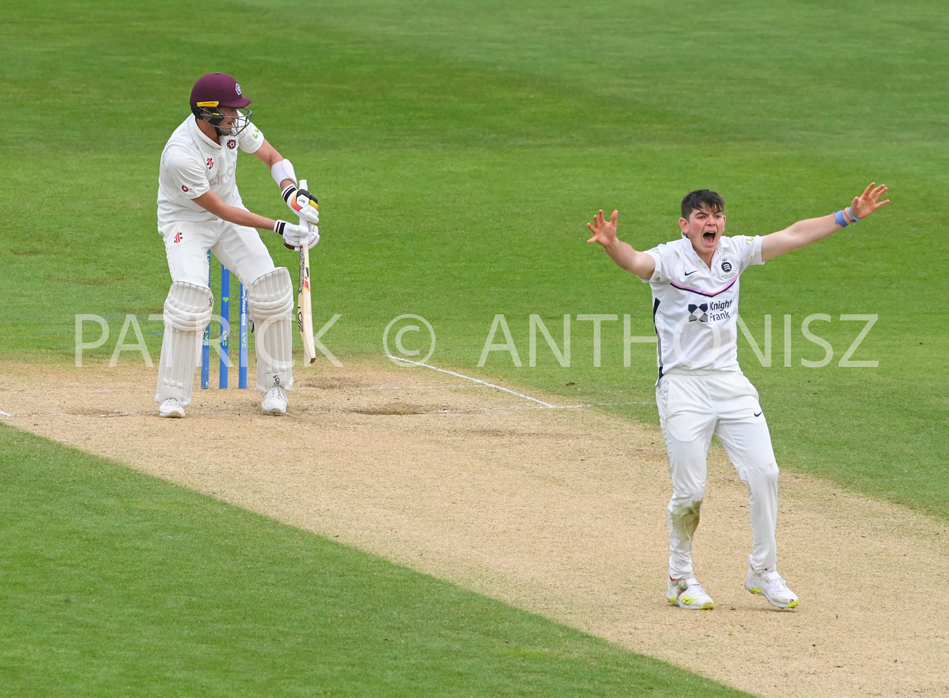 NORTHAMPTON, ENGLAND - April 16 2023 : Ethan Bamber of Middlesex  successfully appeals to the umpire for the wicket of Chris Tremain  LBW during  Day 4 of the LV= Insurance County Championship match between Northamptonshire and   Sun  April  16 at The County Ground  in Northampton, England.