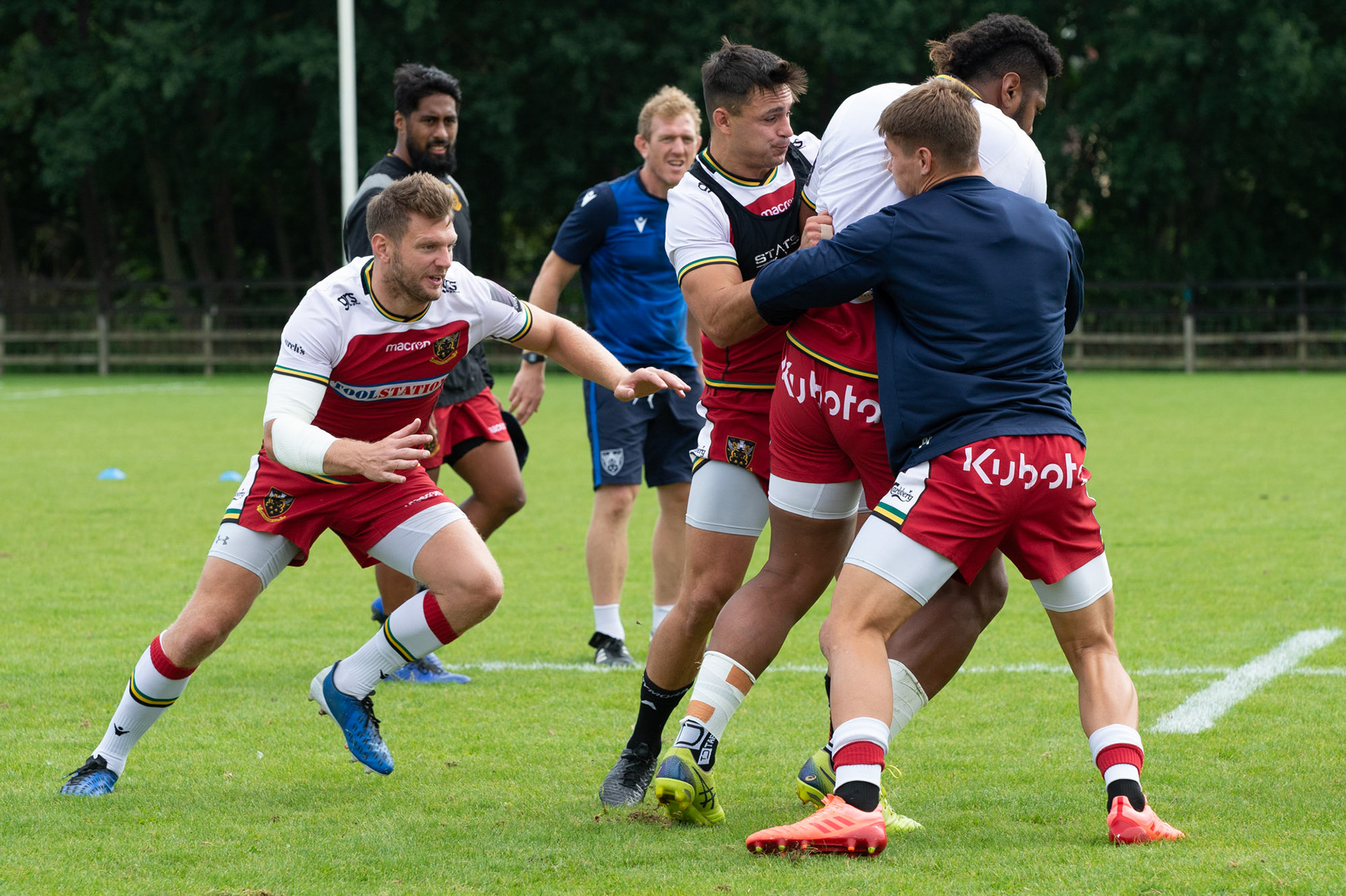 Taqele Naiyaravoro  in yellow boots   in training at the Northampton Saints training session at Franklin's Gardens