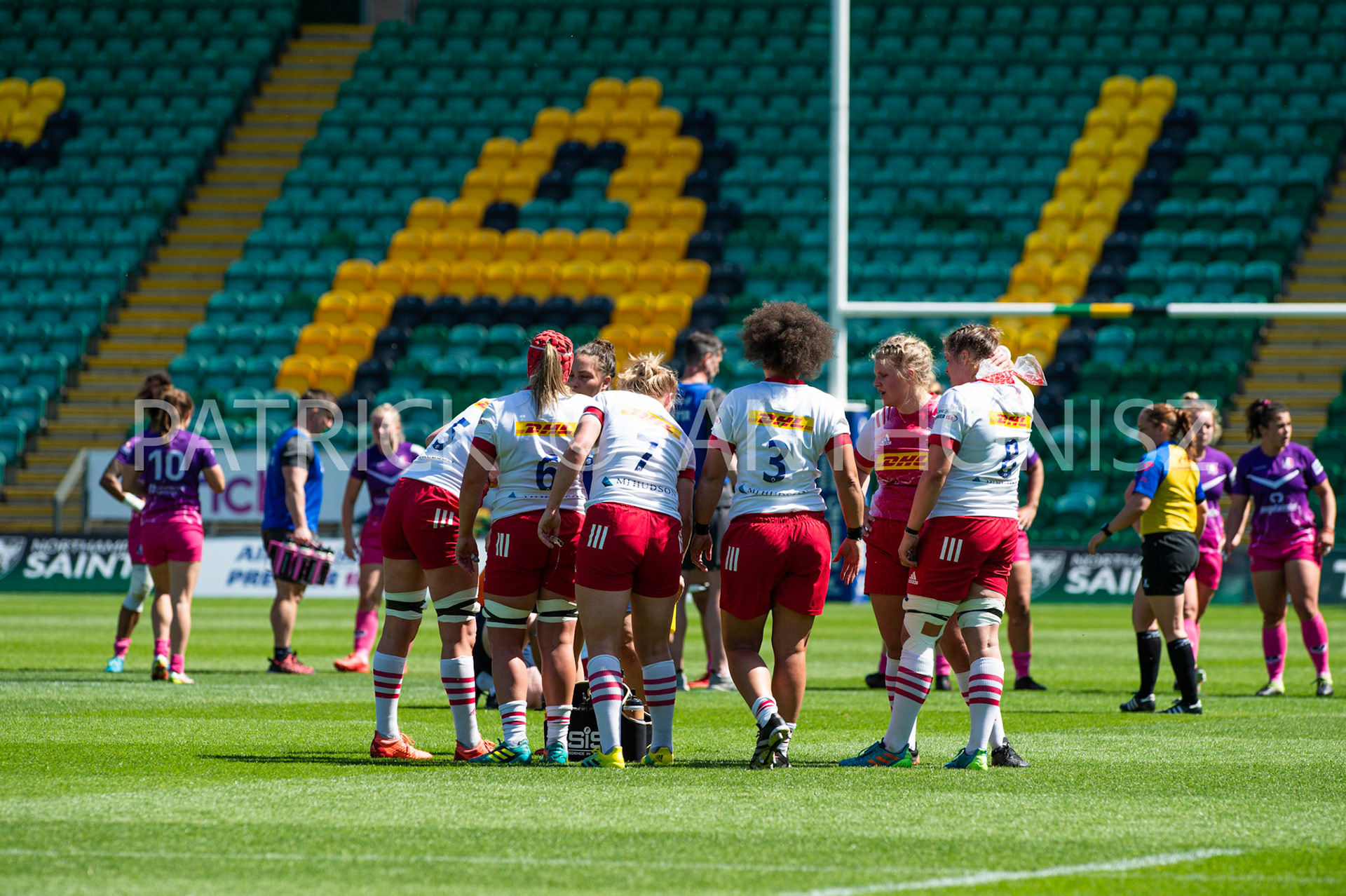 Northampton -14–May-2022. the Harlequins rugby team takes a drink during the  Loughborough Lightning Vs Harlequins Womens match at cinch Stadium Franklin's Gardens Northampton  .