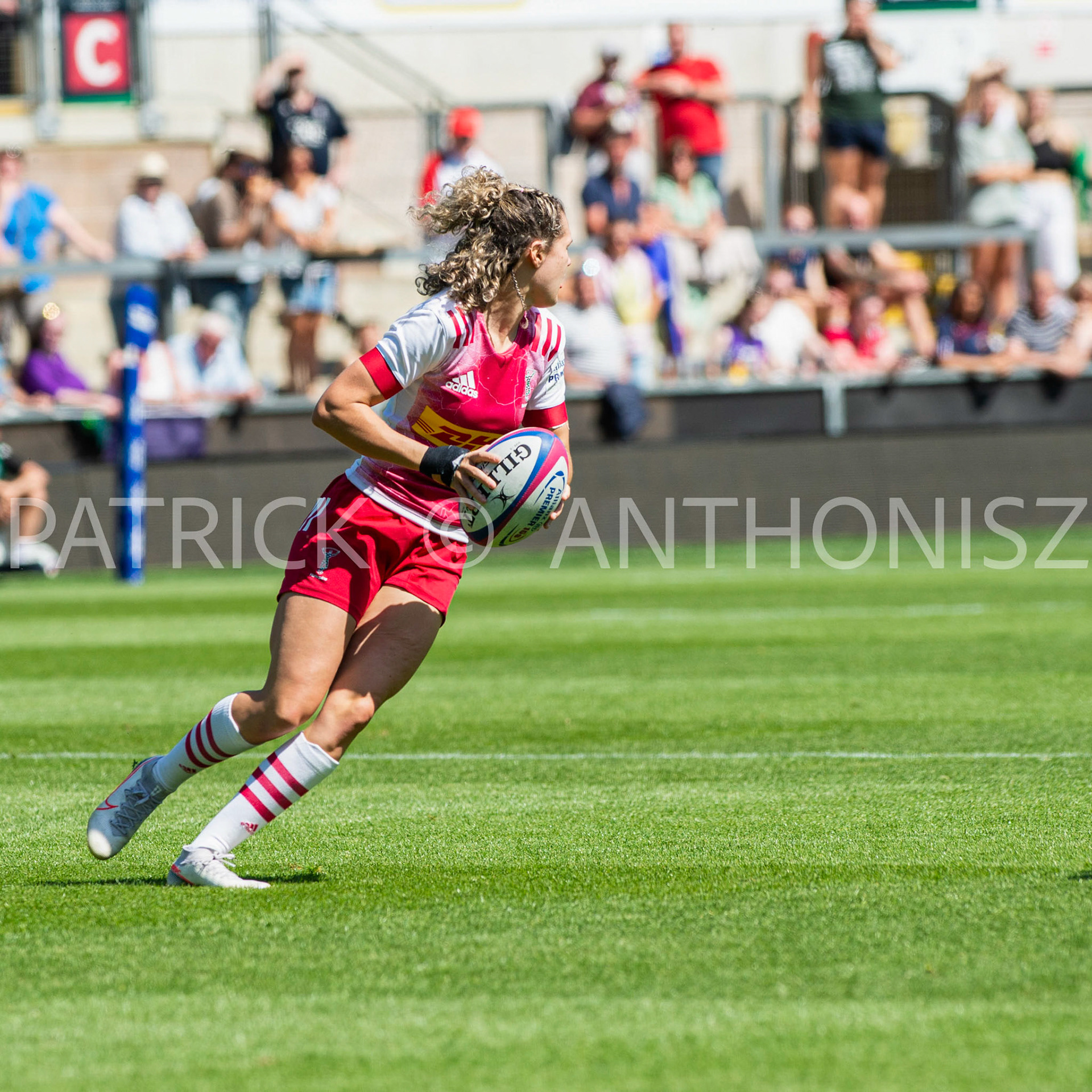Northampton -14–May-2022. Ellie Kildunne of Harlequins runs with the ball during the Loughborough Lightning Vs Harlequins Womens  match at cinch Stadium Franklin's Gardens Northampton  .