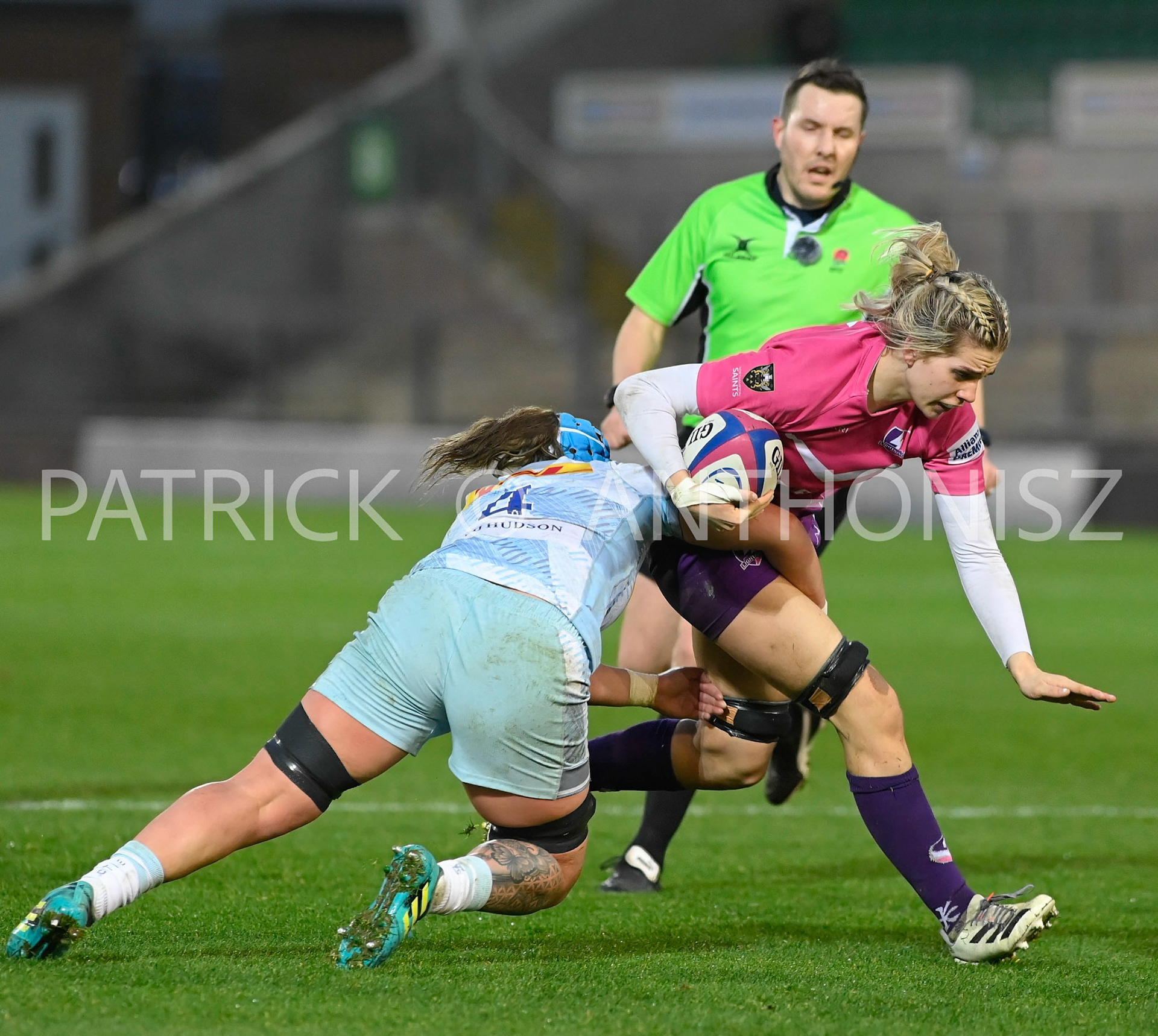 NORTHAMPTON, ENGLAND- Nov -27 - 2022 :  Katy Mew of Harlequins  takes down Lilli Ives Campion of Loughborough Lightning  during the match between Loughborough Lightning Vs Harlequins at Franklin's Gardens on November 27, 2022 in Northampton, England