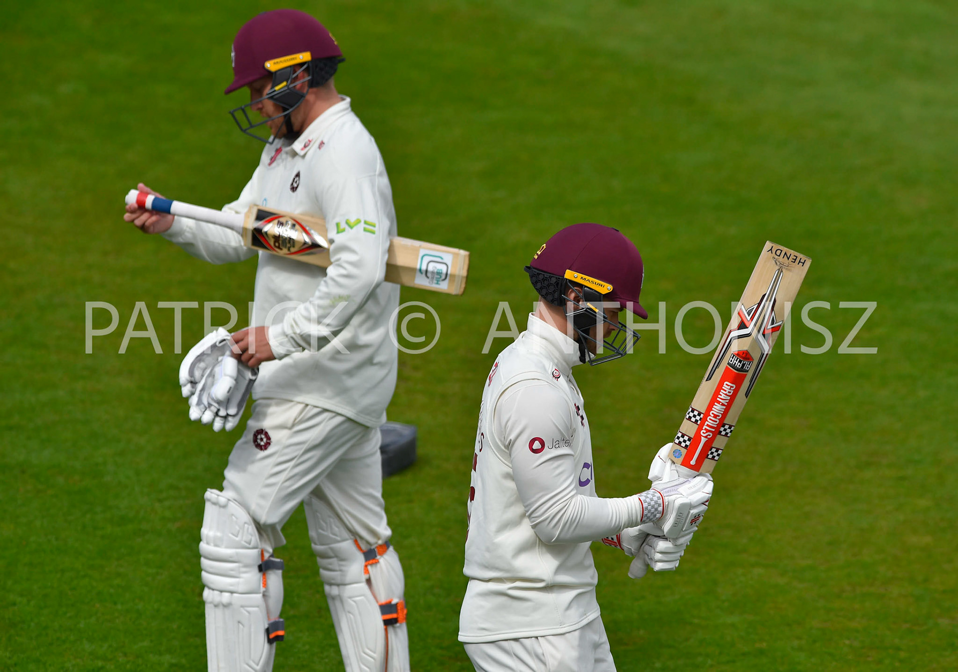 NORTHAMPTON, ENGLAND - April 15 2023 : Josh Cobb on Northampton leaves the field   Lewis Mcmanus  enters the field of play during Day 3 of the LV= Insurance County Championship match between Northamptonshire and   Sat  April  15 at The County Ground  in Northampton, England.