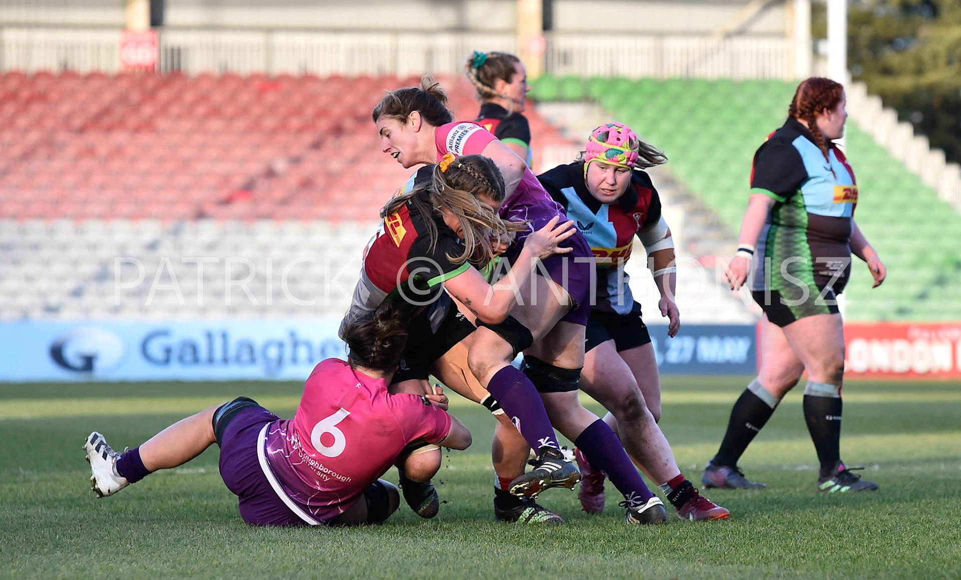 Twickenham, stoop ENGLAND : Sarah Hunter of Loughborough with Rachel Malcolm (c) takes down Kaitlan Leaney  of Harlequins  during the Women's Allianz Premiership 15's match between Harlequins Vs Loughborough Lightning Twickenham Stoop Stadium England 5–02-2023