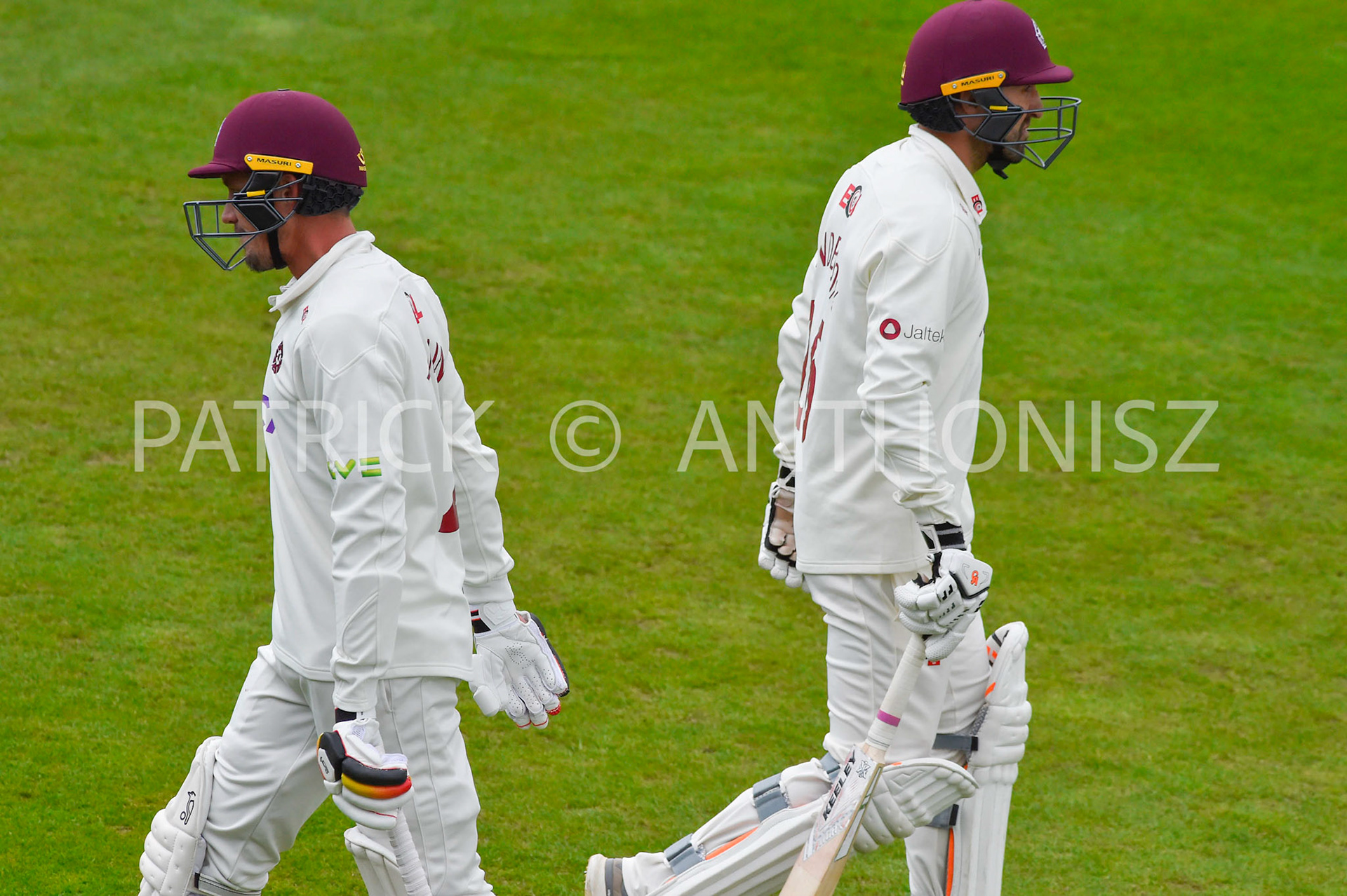 NORTHAMPTON, ENGLAND - April 15 2023 : Chris Tremain leaves the field  Ben Sanderson enters the field Day 3 of the LV= Insurance County Championship match between Northamptonshire and   Sat  April  15 at The County Ground  in Northampton, England.