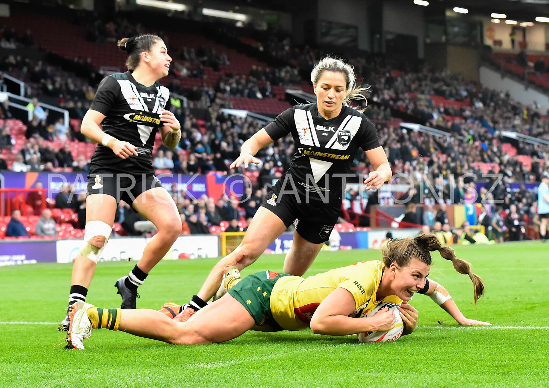 Manchester   ENGLAND - NOVEMBER 19. Jessica Sergis of Australia gets a try during  the Rugby league World Cup Womens Final  between Australia and New Zealand  at the Old Trafford   on November 19 - 2022 in Manchester England.
