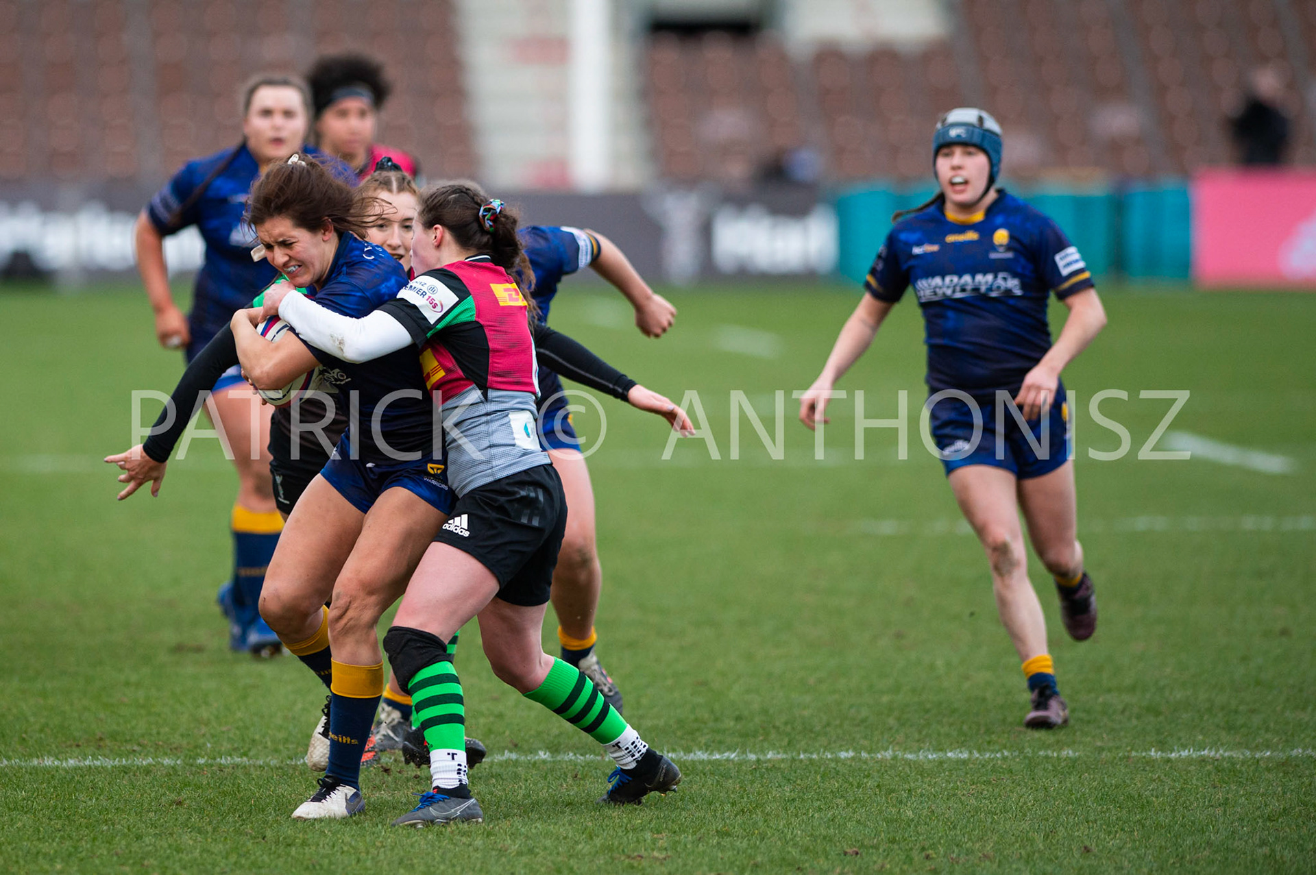 Harlequins Women Vs  Worcester WarriorsWomen's Allianz Premier 15sLondon,England February 12th 2022:  Megan Varley of Worcester Warriors  is stop by  Lucy Packer of Harlequins  match between  Harlequins Women Vs  Worcester Warriors at Twickenham Stoop .Final score:  Harlequins Rugby 42 : 15 Worcester Warriors