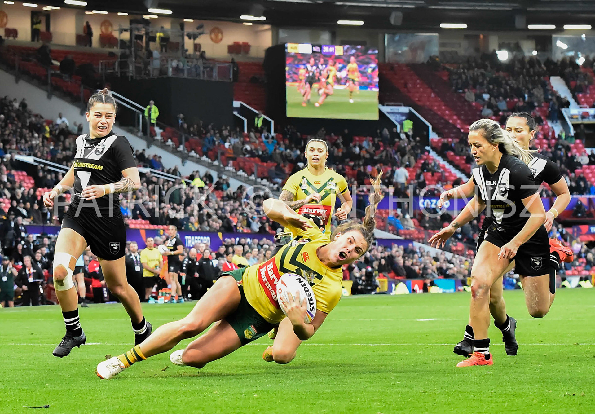 Manchester   ENGLAND - NOVEMBER 19. Jessica Sergis of Australia gets a try during  the Rugby league World Cup Womens Final  between Australia and New Zealand  at the Old Trafford   on November 19 - 2022 in Manchester England.