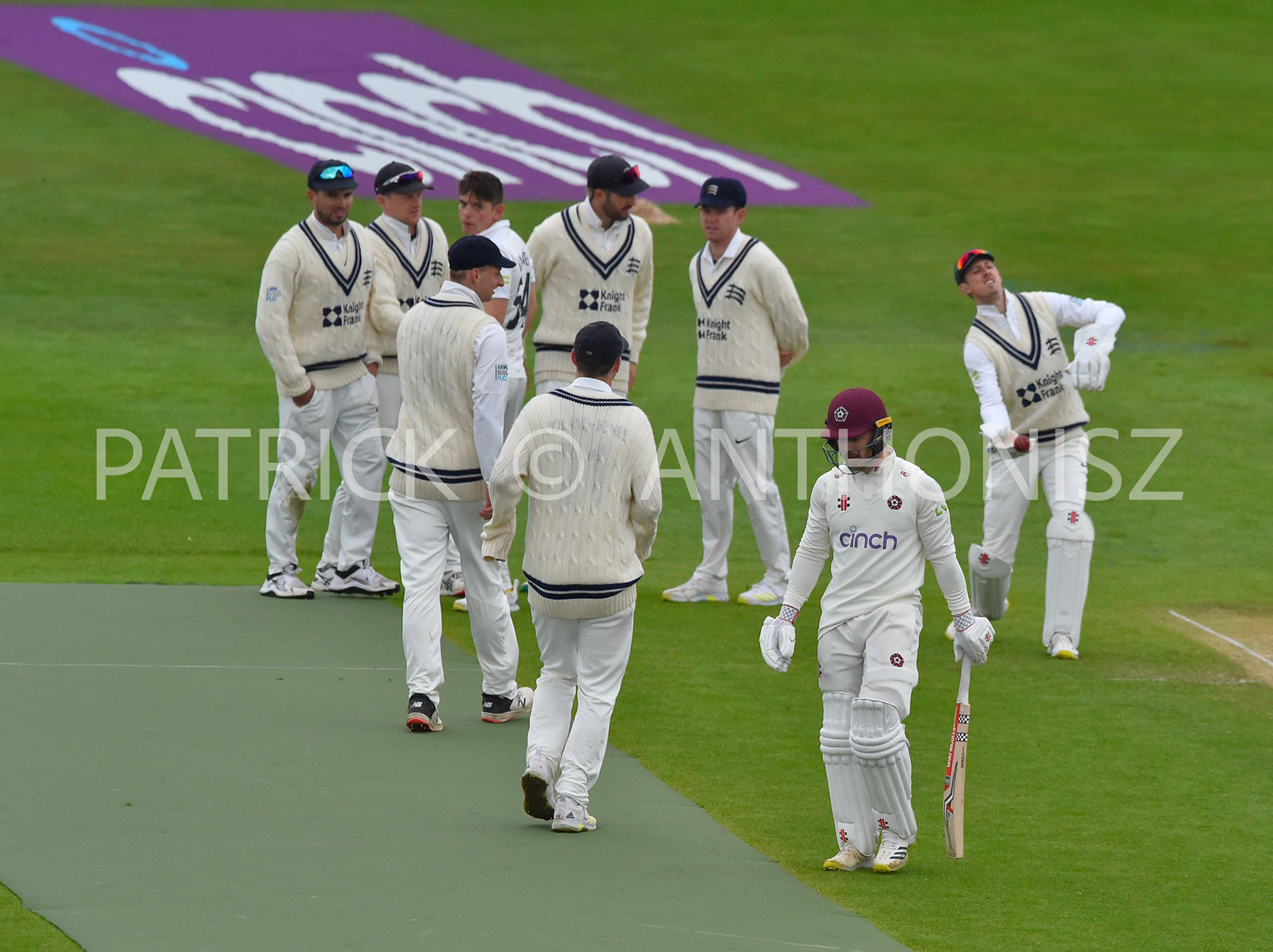 NORTHAMPTON, ENGLAND - April 15 2023 : Middlesex celebrates while Lewis Mcmanus leaves the field Day 3 of the LV= Insurance County Championship match between Northamptonshire and   Sat  April  15 at The County Ground  in Northampton, England.