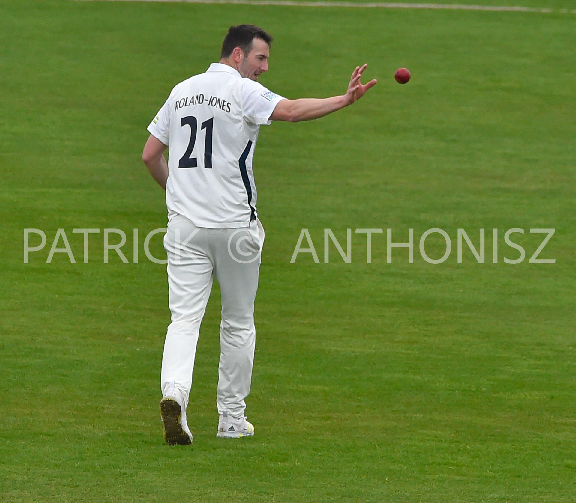 NORTHAMPTON, ENGLAND - April 15 2023 : TOBY ROLAND-JONES of Middlesex keeps his eye on the ball during the  Day 3 of the LV= Insurance County Championship match between Northamptonshire and   Sat  April  15 at The County Ground  in Northampton, England.