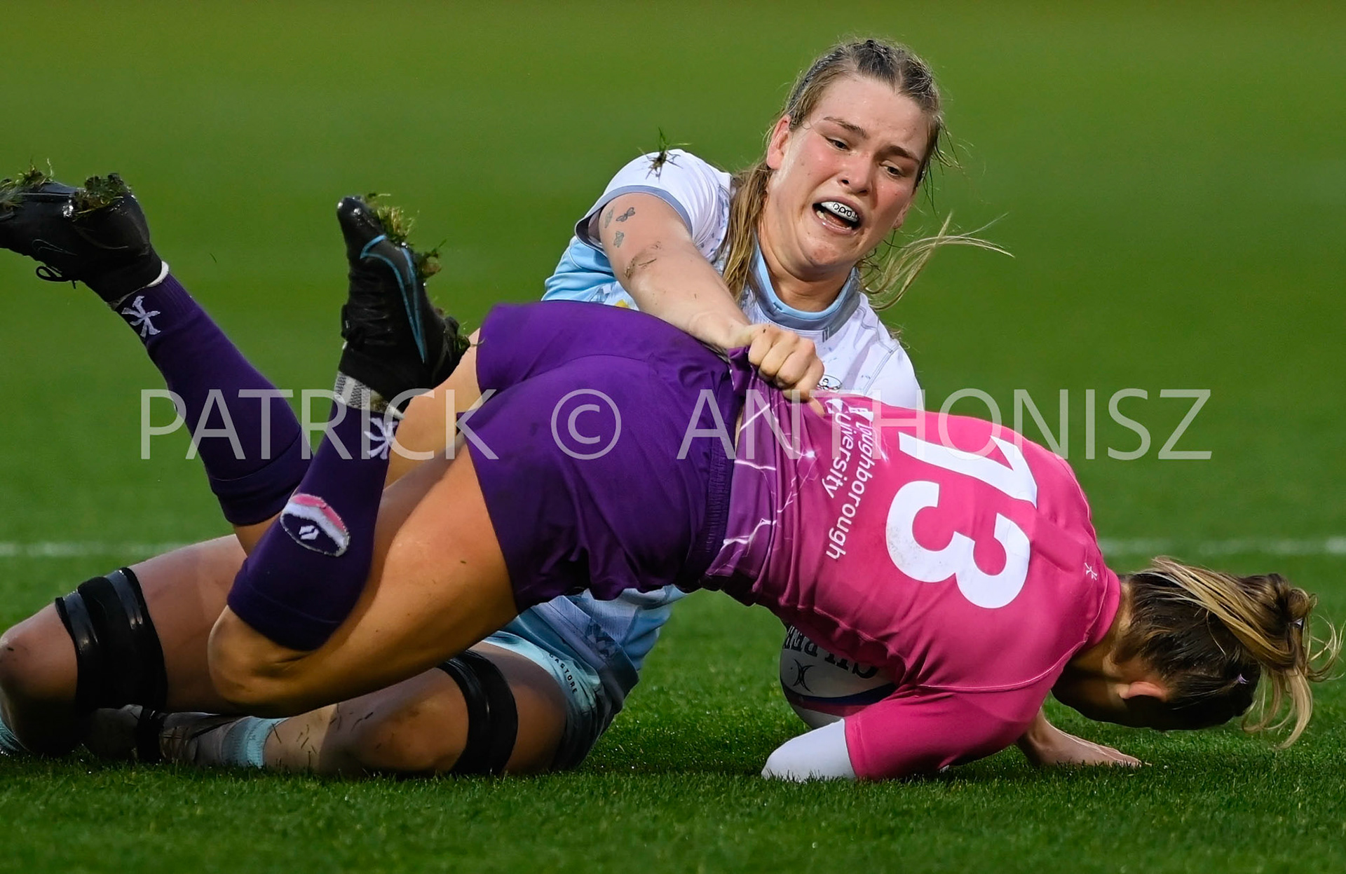 NORTHAMPTON, ENGLAND- Nov -27 - 2022 :  Kaitlan Leaney  of HARLEQUINS  takes down Georgina Tasker during of  Loughborough  during the  match between Loughborough Lightning Vs Harlequins at Franklin's Gardens on November 27, 2022 in Northampton, England