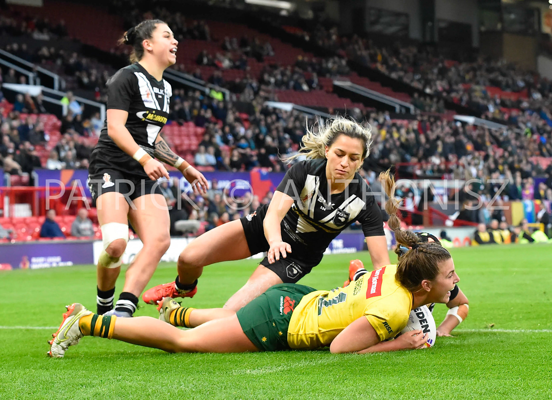 Manchester   ENGLAND - NOVEMBER 19. Jessica Sergis of Australia gets a try during  the Rugby league World Cup Womens Final  between Australia and New Zealand  at the Old Trafford   on November 19 - 2022 in Manchester England.
