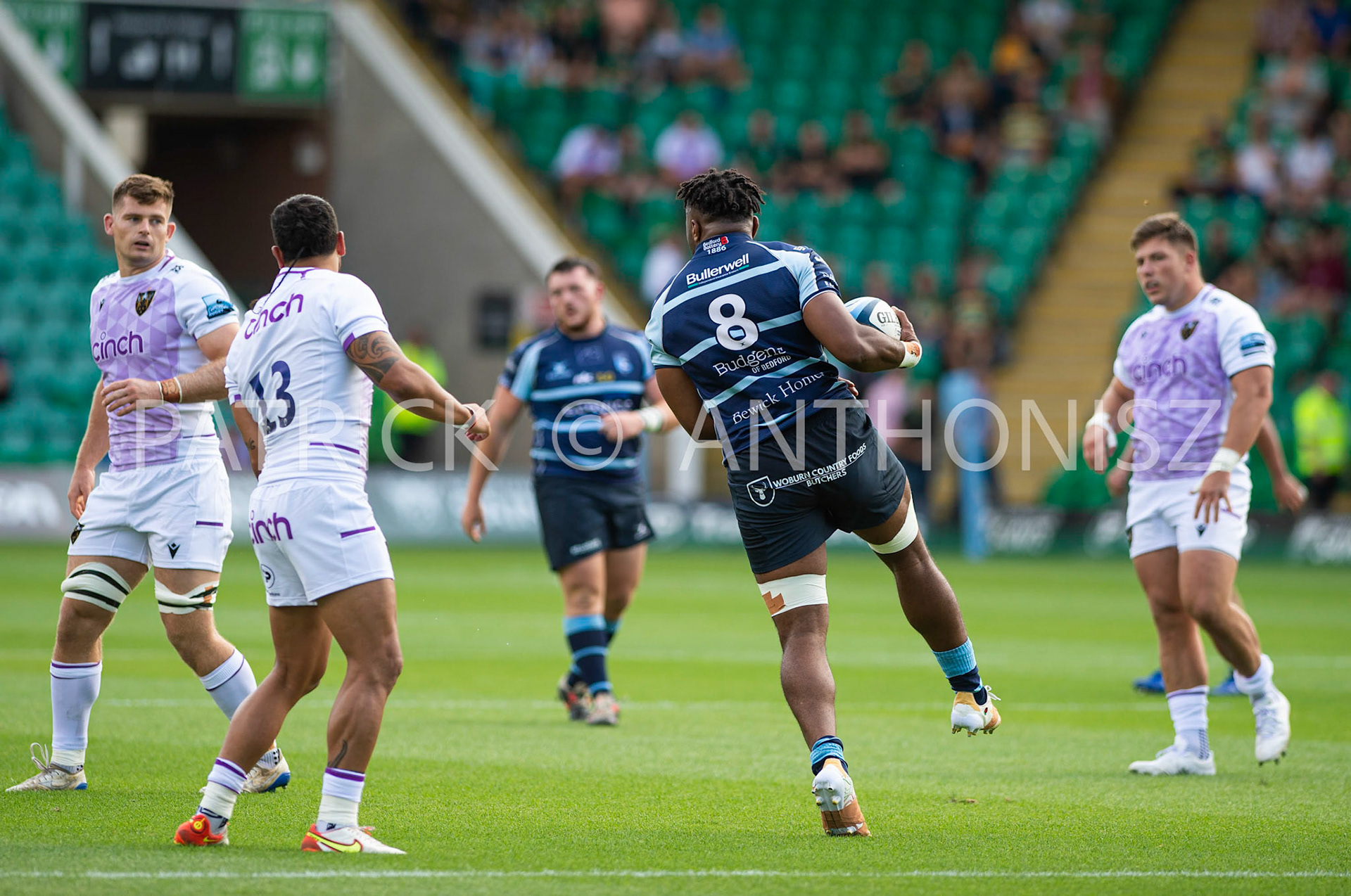 NORTHAMPTON, ENGLAND - August 27 : 2022 NO 8  Tui Uru of Bedford blues runs with the ball during the matck between  Northampton Saints and Bedford Blues   at Franklin's Gardens on August 27  2022 in Northampton, England.