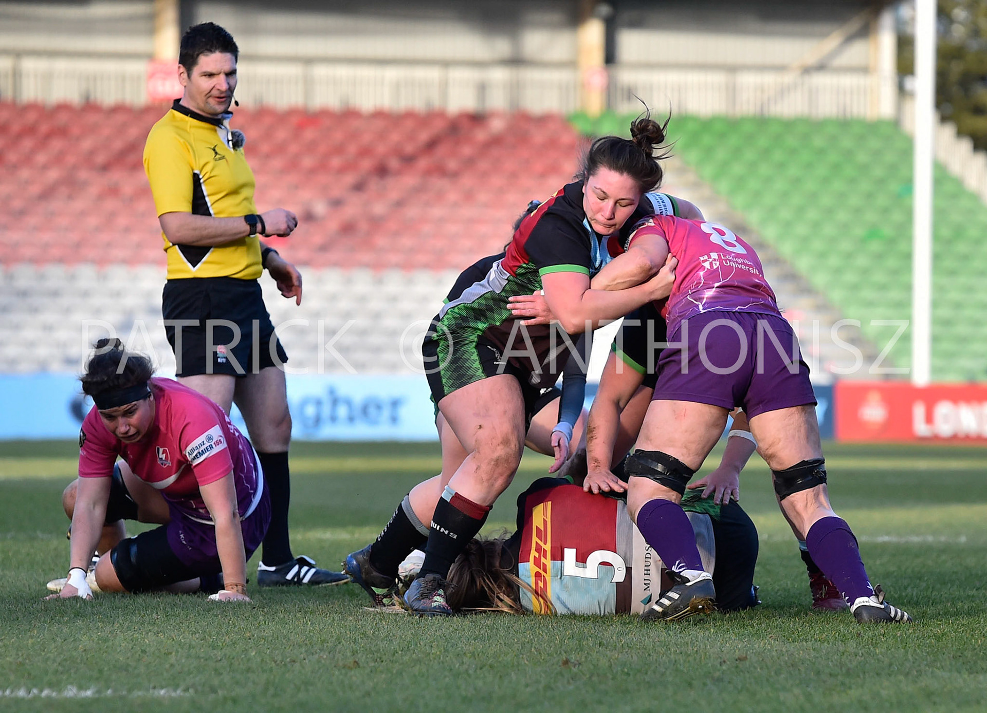 Twickenham, stoop ENGLAND : Sarah Hunter of Loughborough with Amy Cokayne (cc) in action with Kaitlan Leaney  on the ground during the Women's Allianz Premiership 15's match between Harlequins Vs Loughborough Lightning Twickenham Stoop Stadium England 5–02-2023