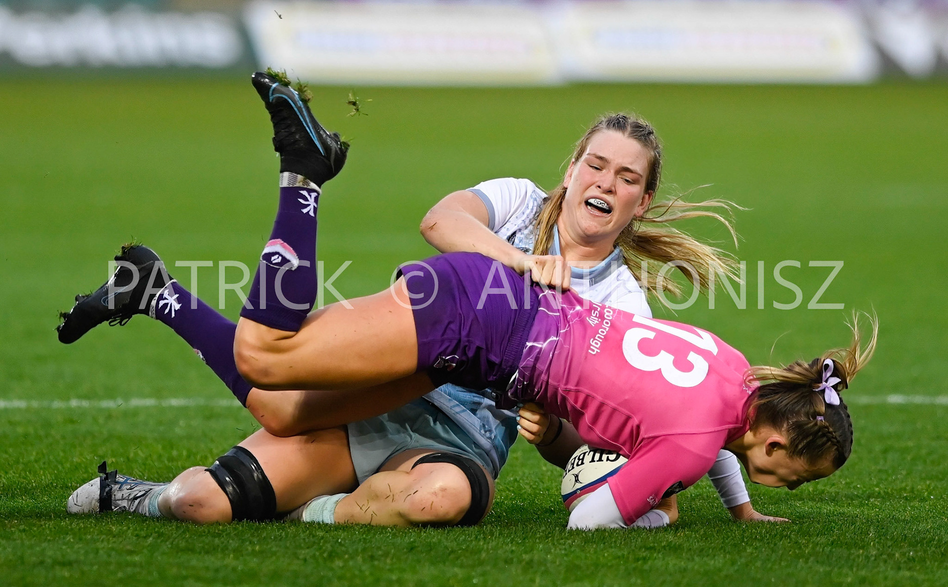 NORTHAMPTON, ENGLAND- Nov -27 - 2022 : Kaitlan Leaney of  Harlequins takes down  Georgina Tasker  of Loughborough Lightning during the match between Loughborough Lightning Vs Harlequins at Franklin's Gardens on November 27, 2022 in Northampton, England