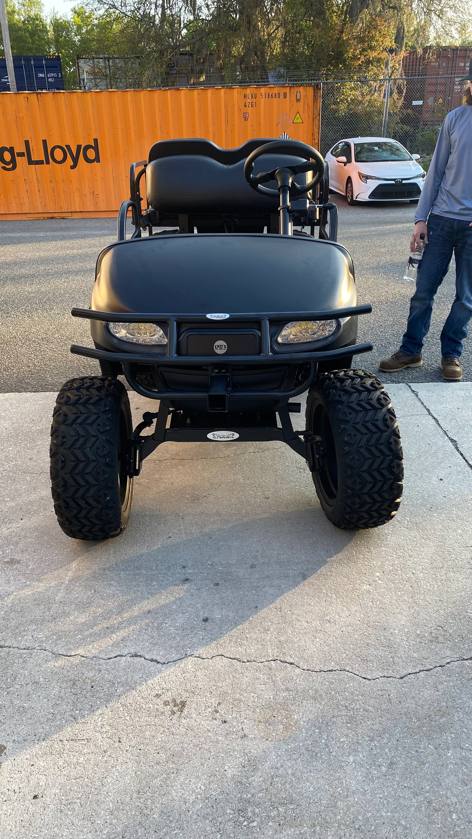 The 2023 EZ GO TXT CUSOM GOLF CART. CAPABLE OF 30+ MPH FULLY ADJUSTABLE FOR SLOW WALK AD TALKS TO FAST CHASE SEQUENCES.