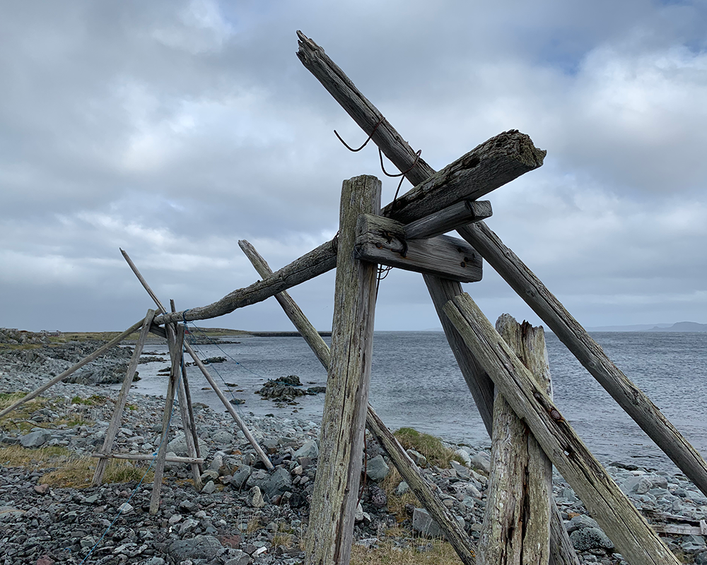 Fish Drying Rack along the Rock Coastline of the Barents Sea in Finnmark Region of Norway