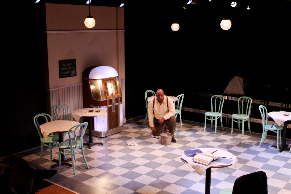 Alley-style stage in a black box theatre