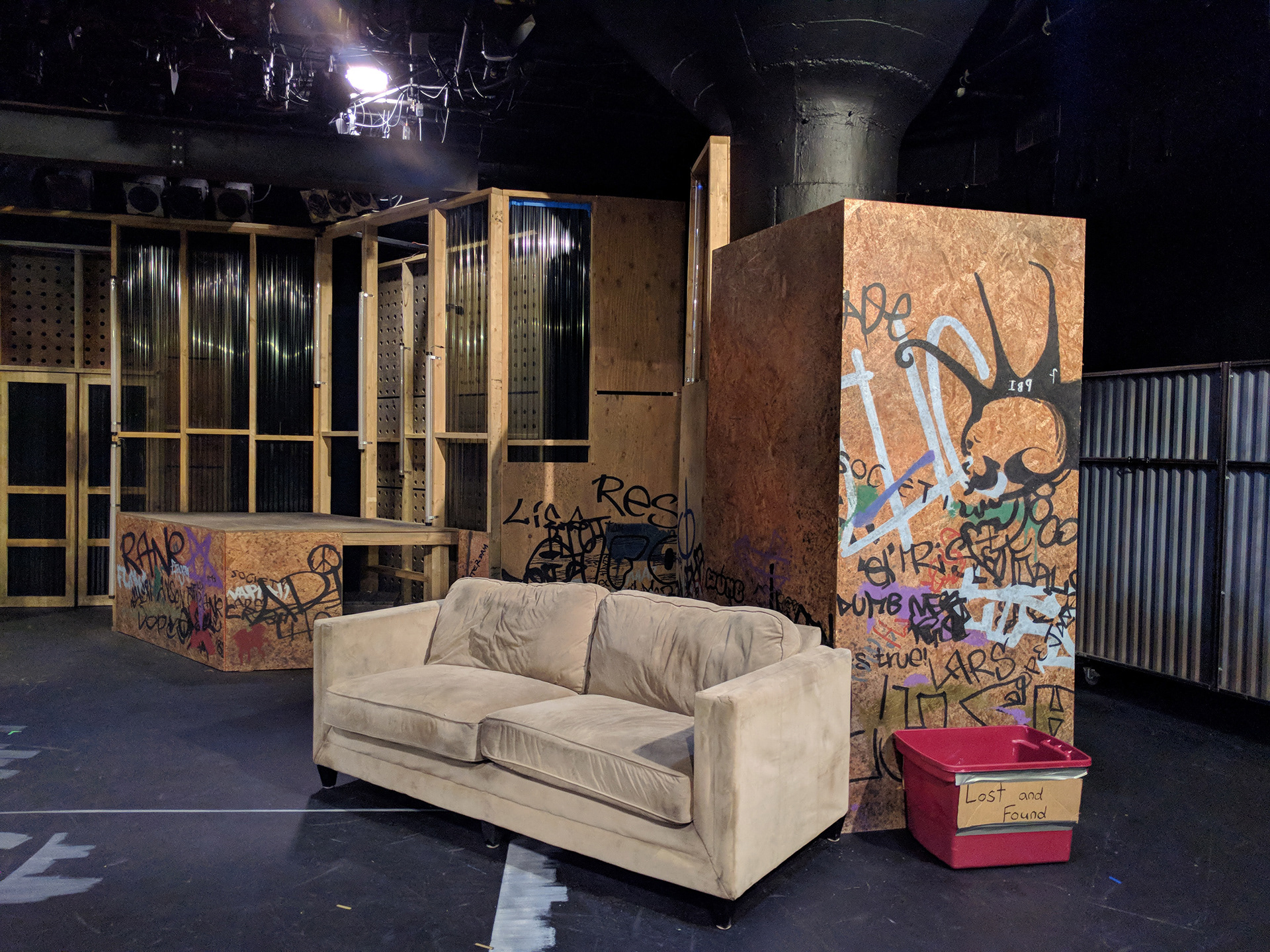 Textures: OSB, plywood, corrugated plastic sheeting, graffiti.