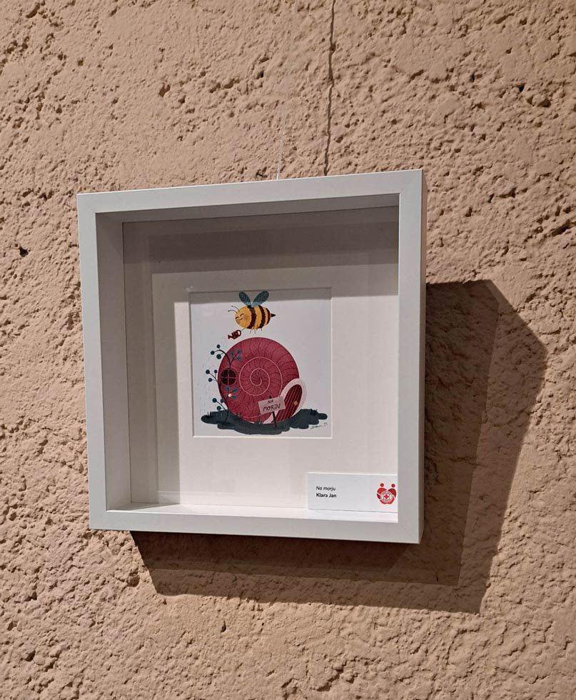 Ilustracija Na morju v okvirju.
