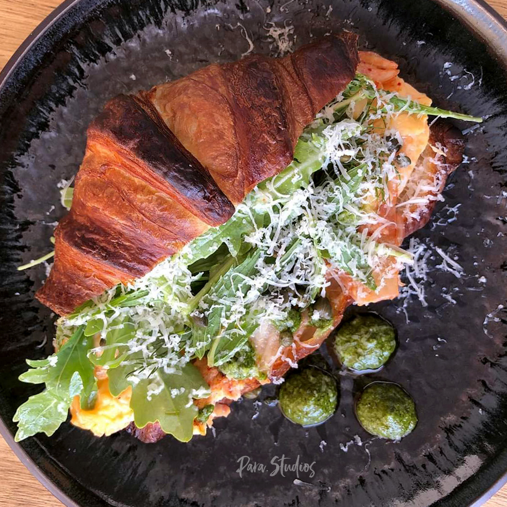 Folded eggs, kimchi, salsa verde, provolone cheese, capers and rocket