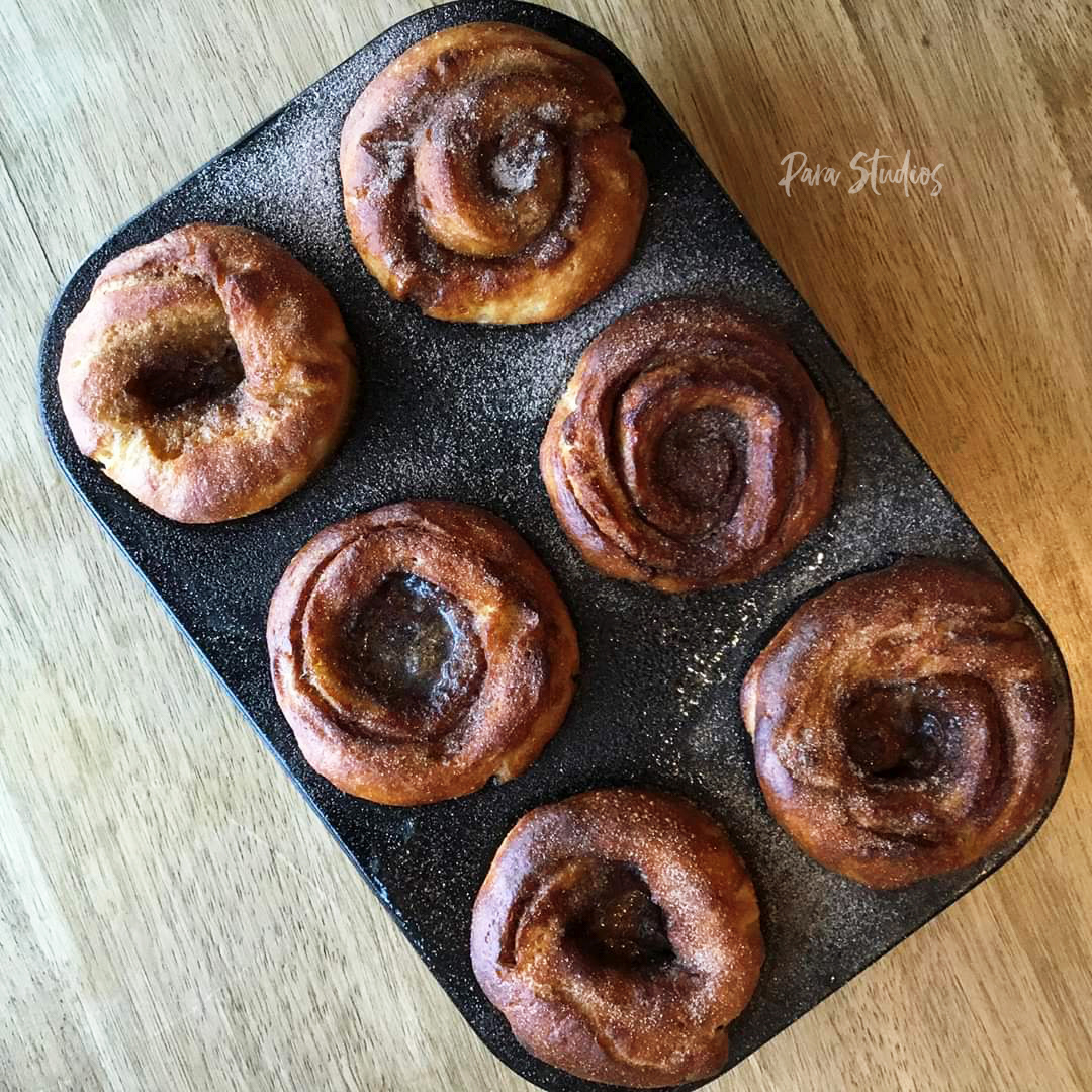 Morning buns with a burnt orange glaze