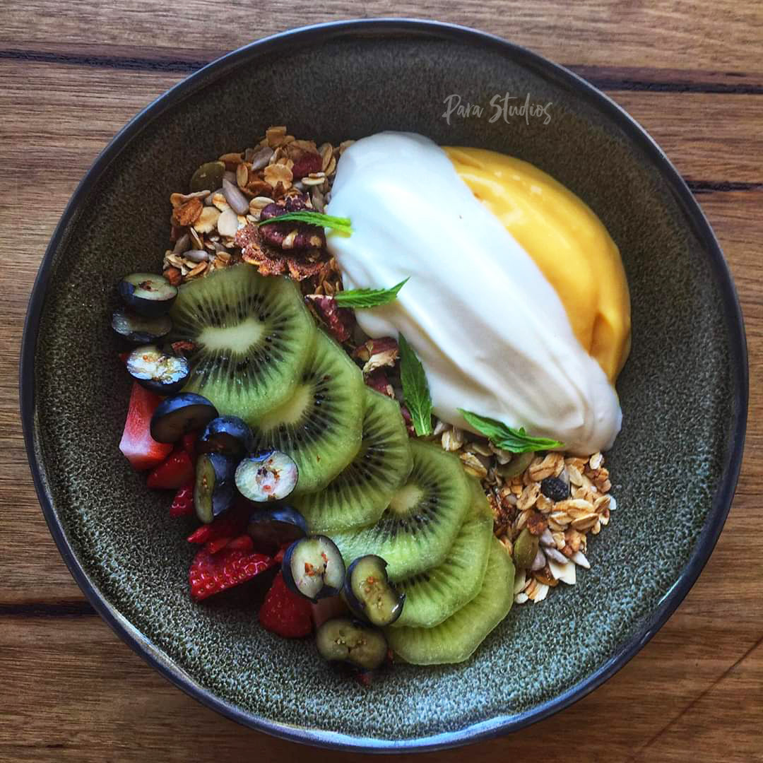 House granola, fresh fruits, passionfruit curd and yoghurt