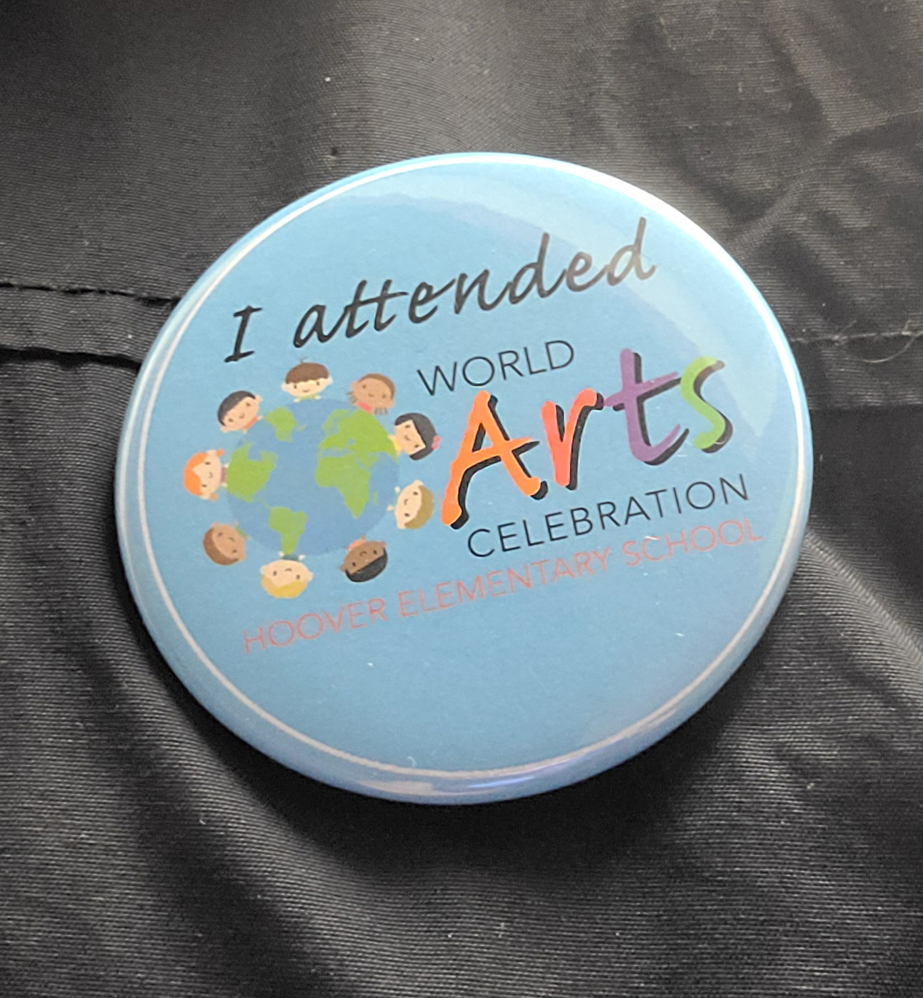 Button created in-house.