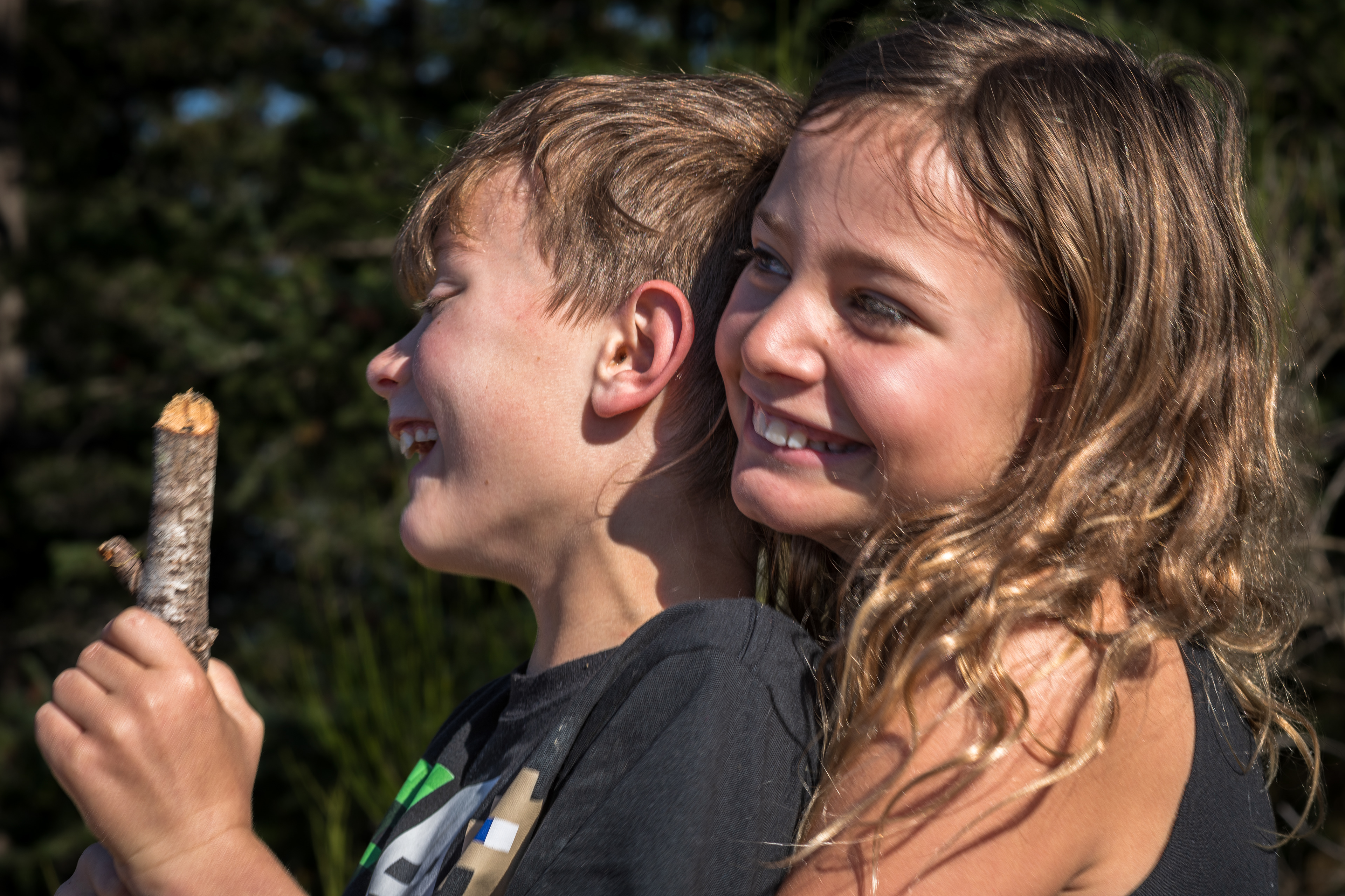 Brother and sister embrace