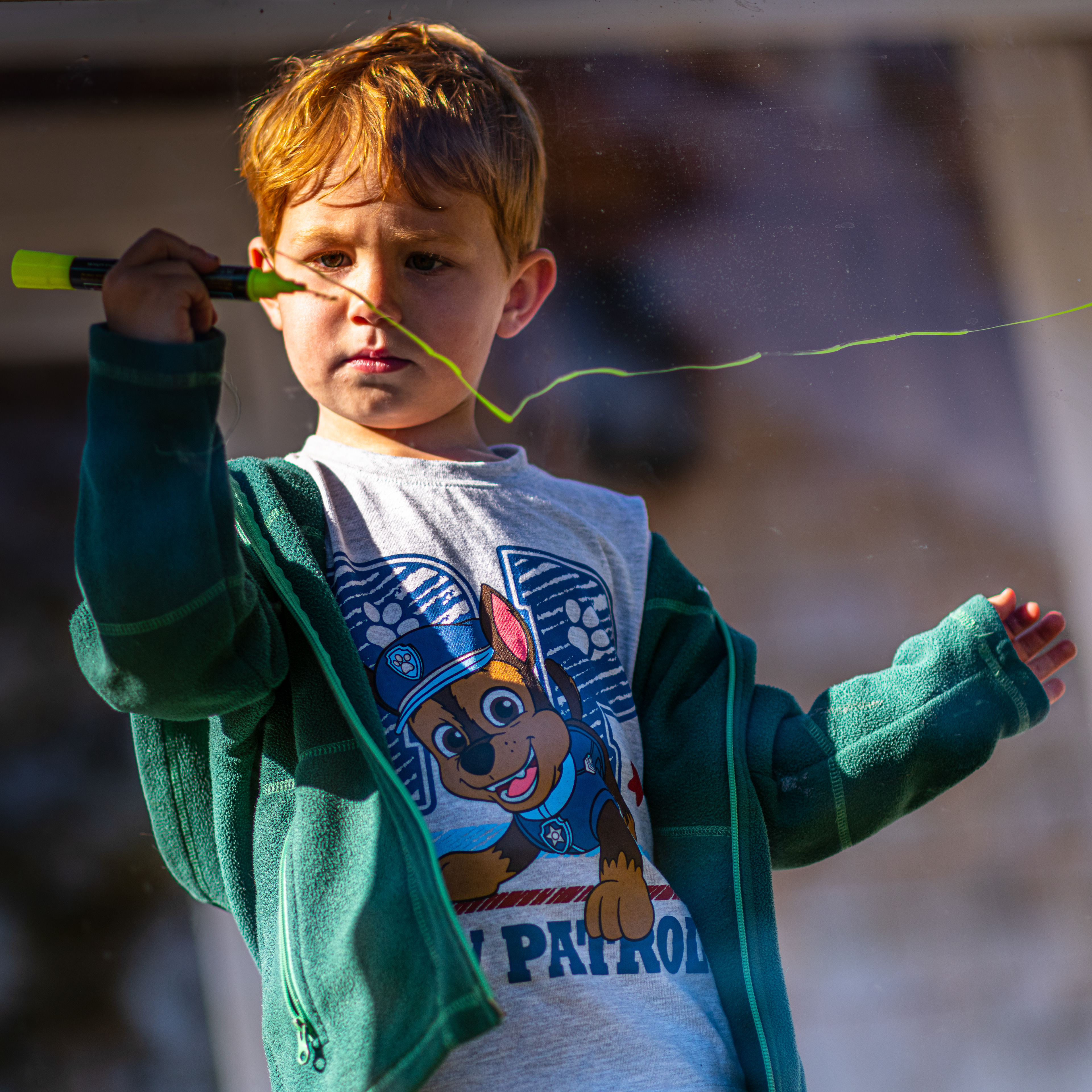 Young artist concentrating on drawing