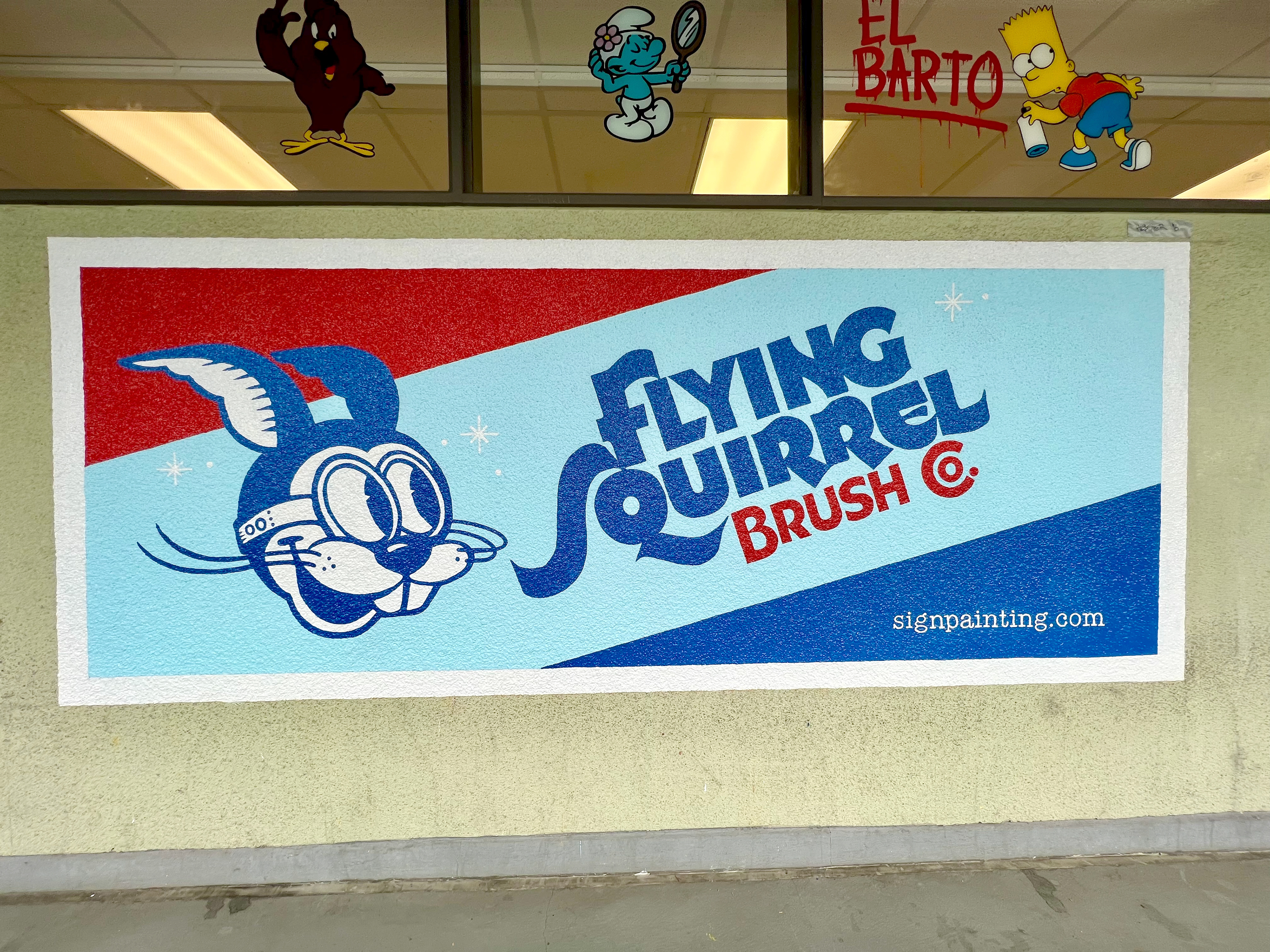 Latex and enamel on rough stucco wall