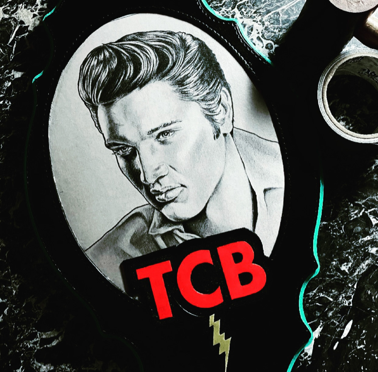 Graphite on board with carved leather frame on wood plaque 