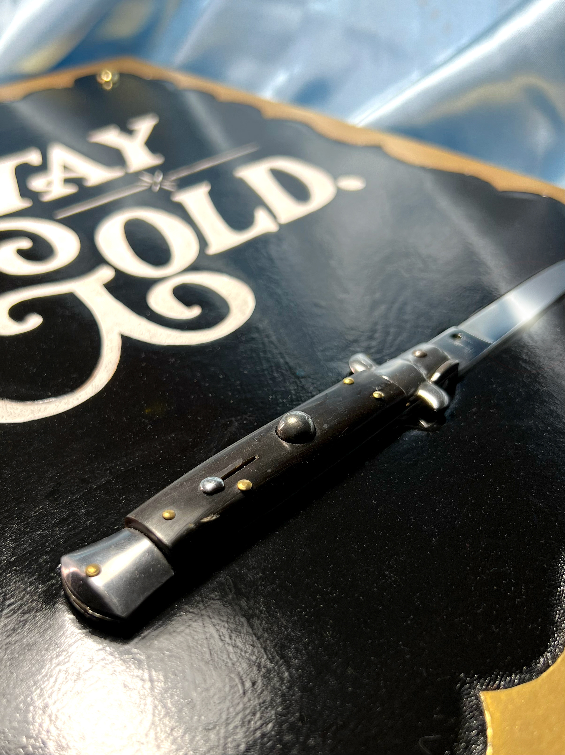 Carved Leather on wood plaque with straight razor for The Outsiders House Museum Tulsa, Oklahoma 