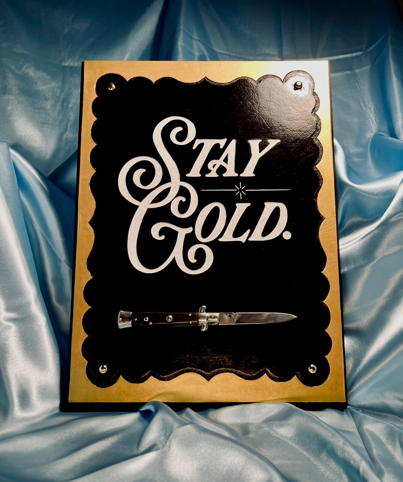 Carved Leather on wood plaque with straight razor for The Outsiders House Museum Tulsa, Oklahoma 