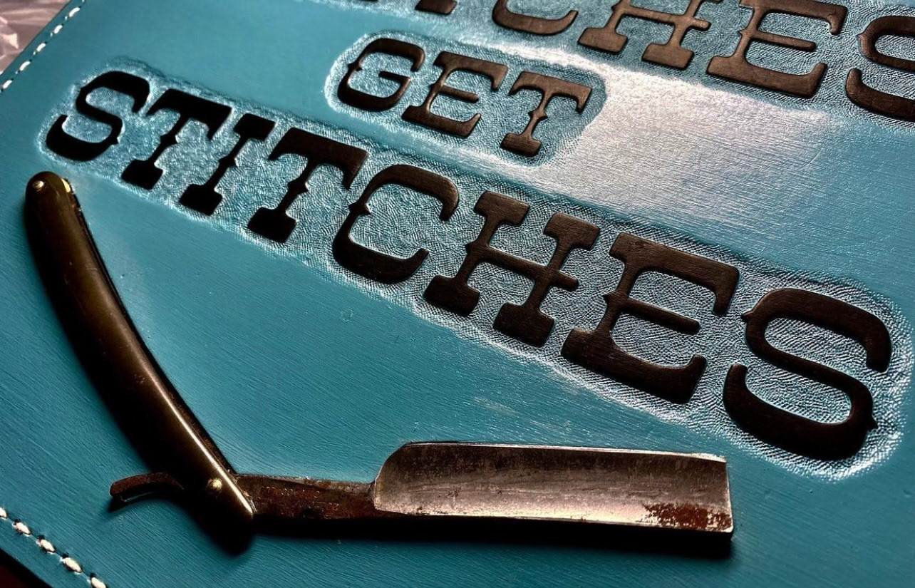 Carved Leather on wood plaque with straight razor for Tattoo Charity  Benefit