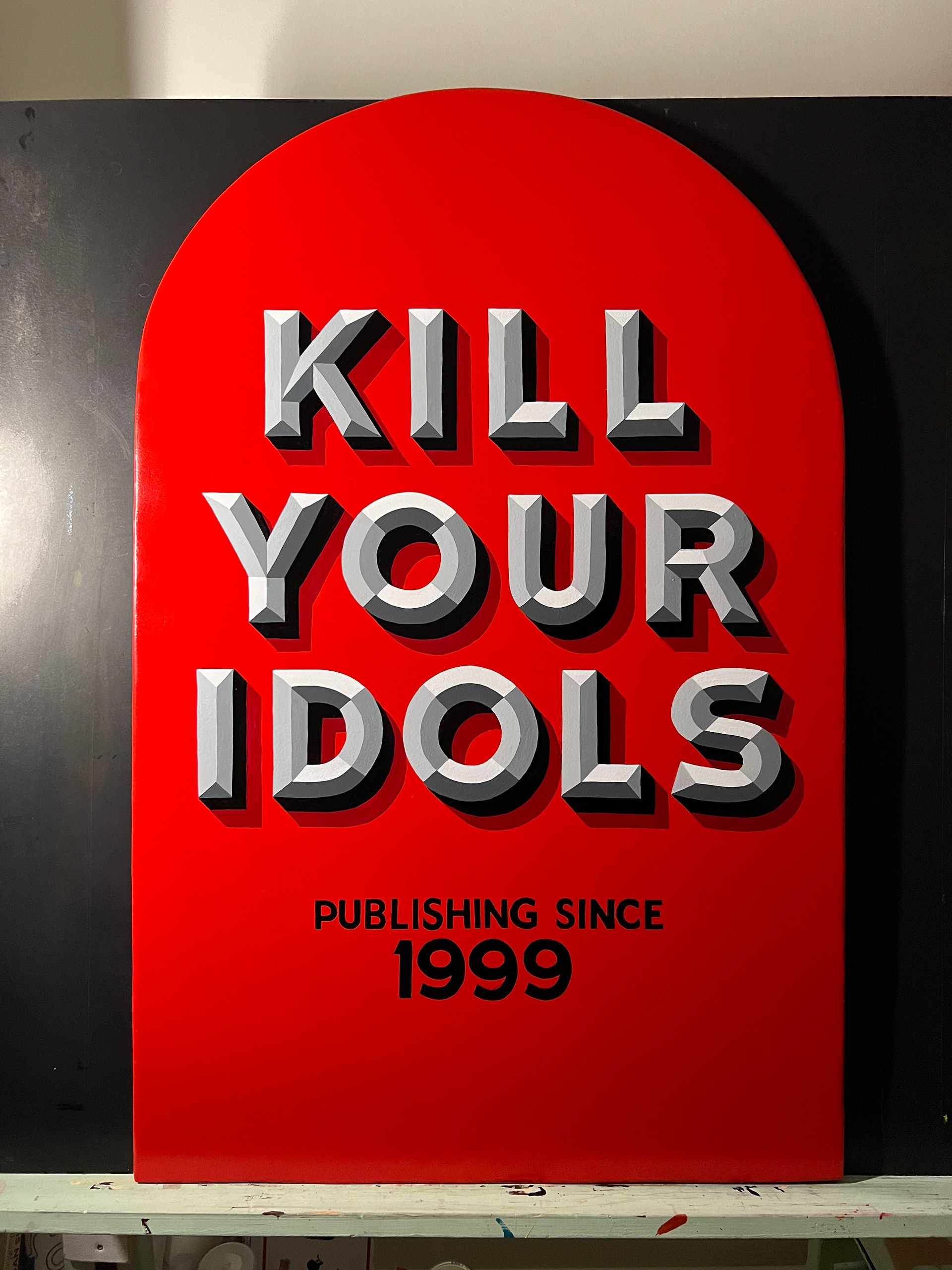 Hand Painted Sandwich Board for Kill Your Idols Publishing