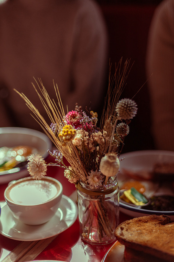 bunch of dried flowers on a kitchen table