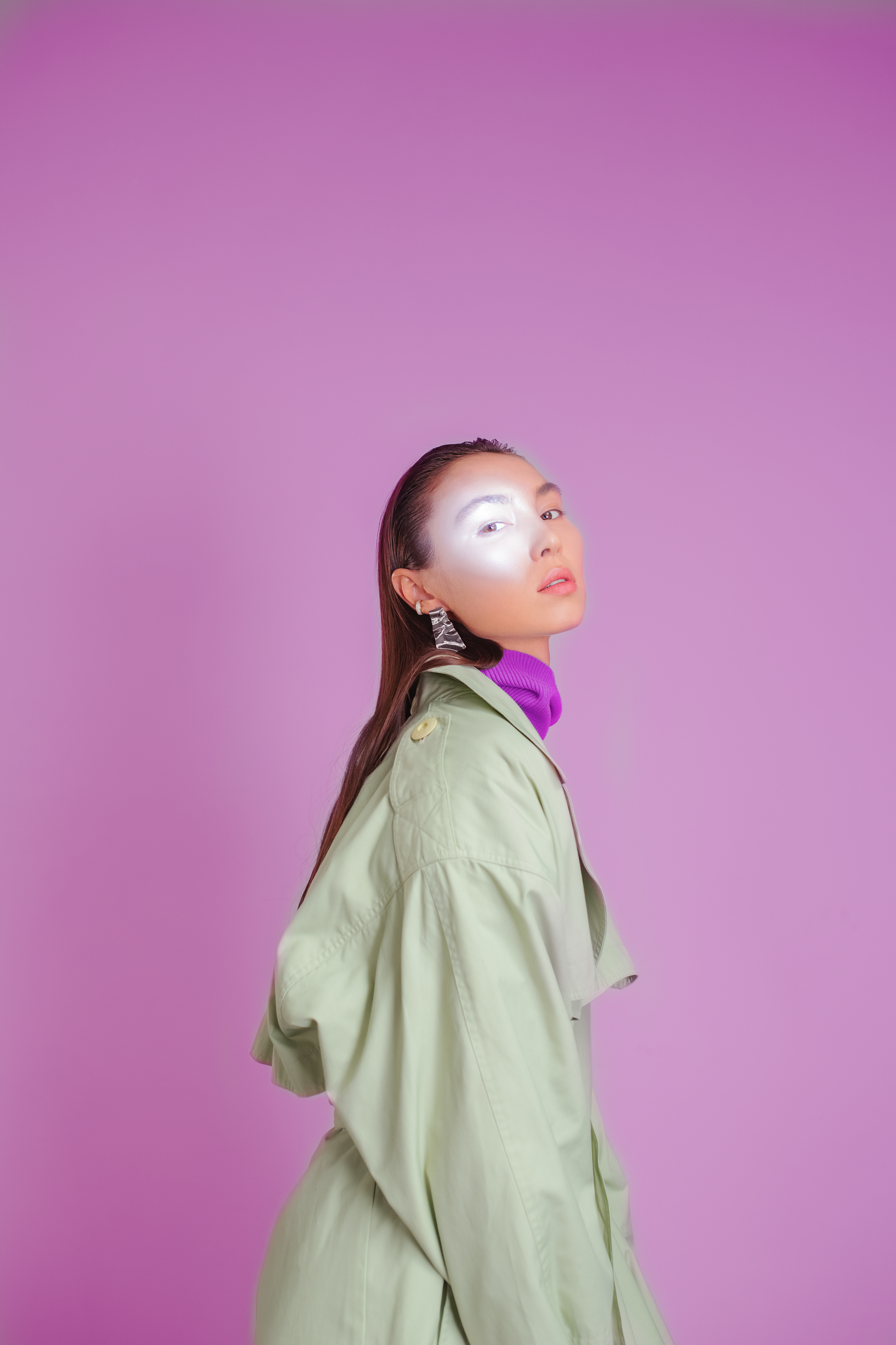 editorial shot with a purple background